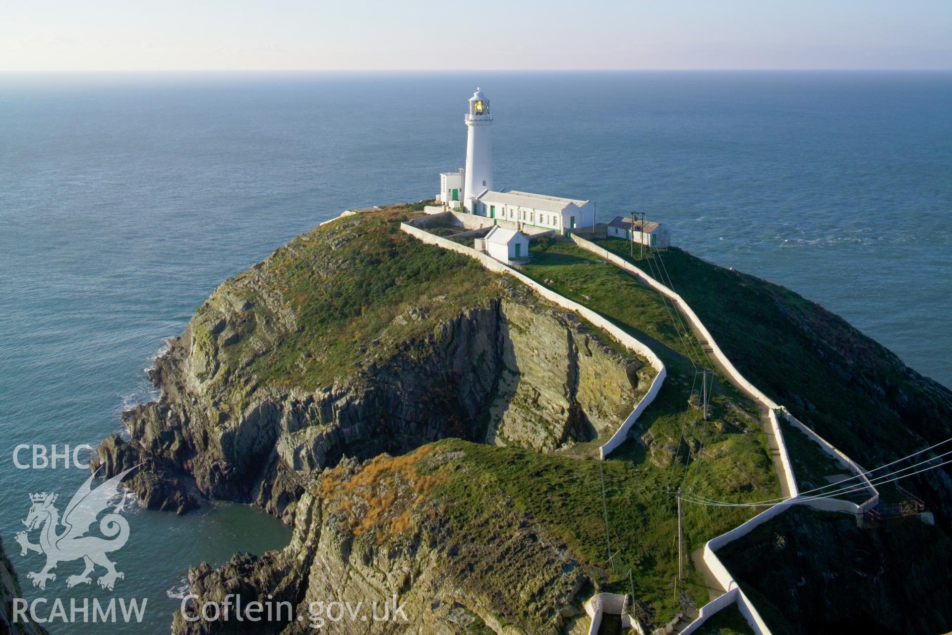 View from the east, lighthouse, promentary and protective walls.