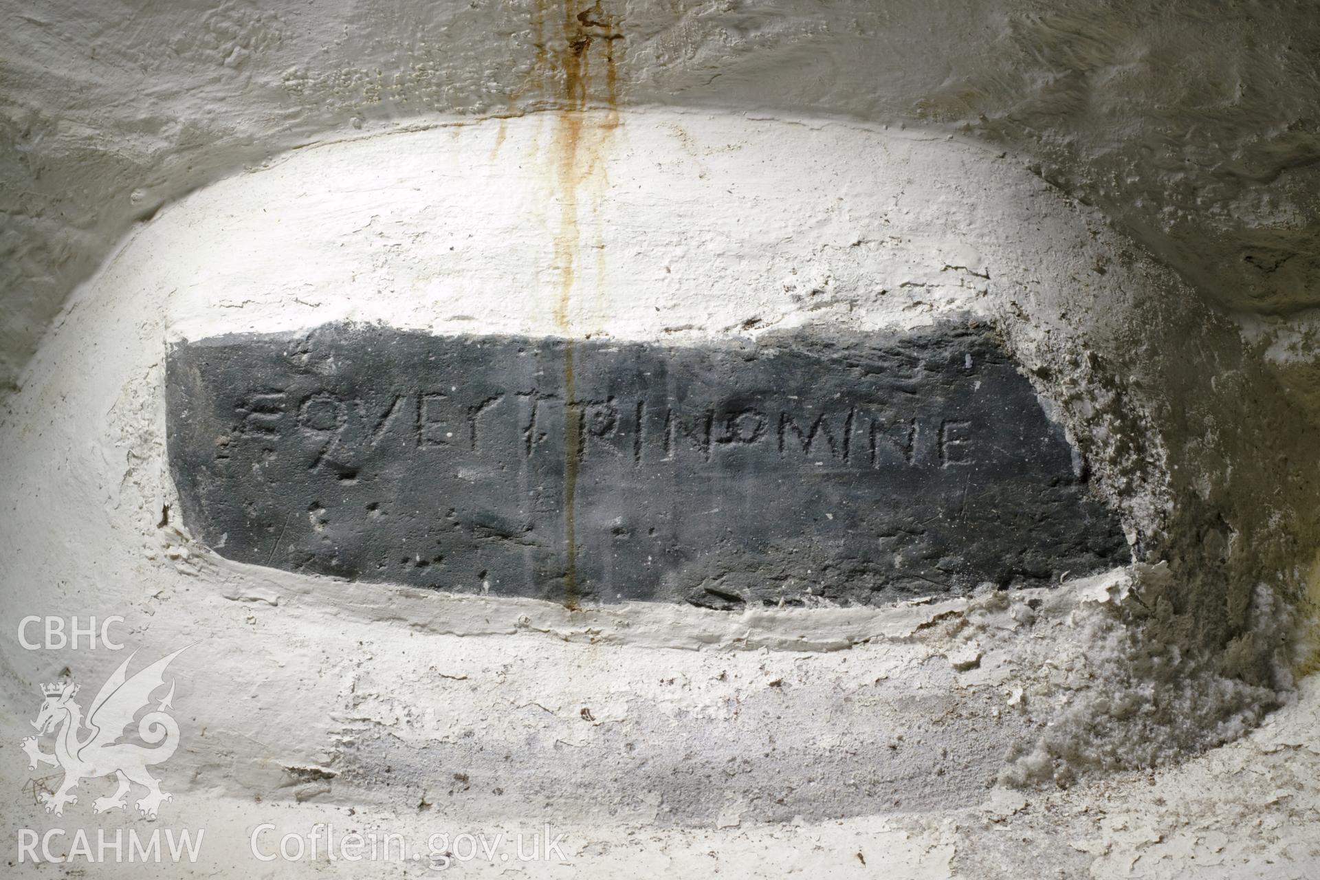 Inscribed stone beneath north window