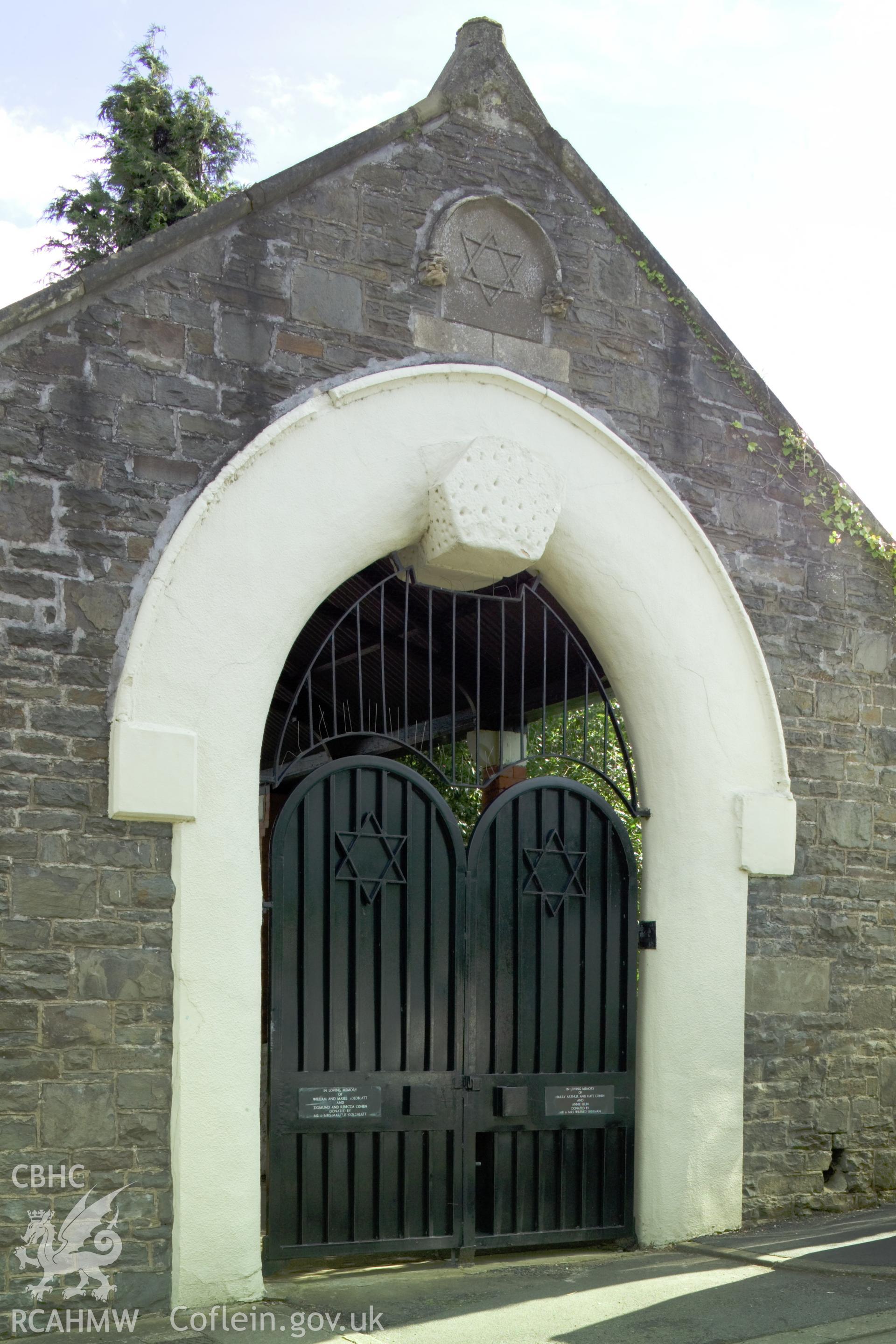 Entrance building, with star of David on gate.