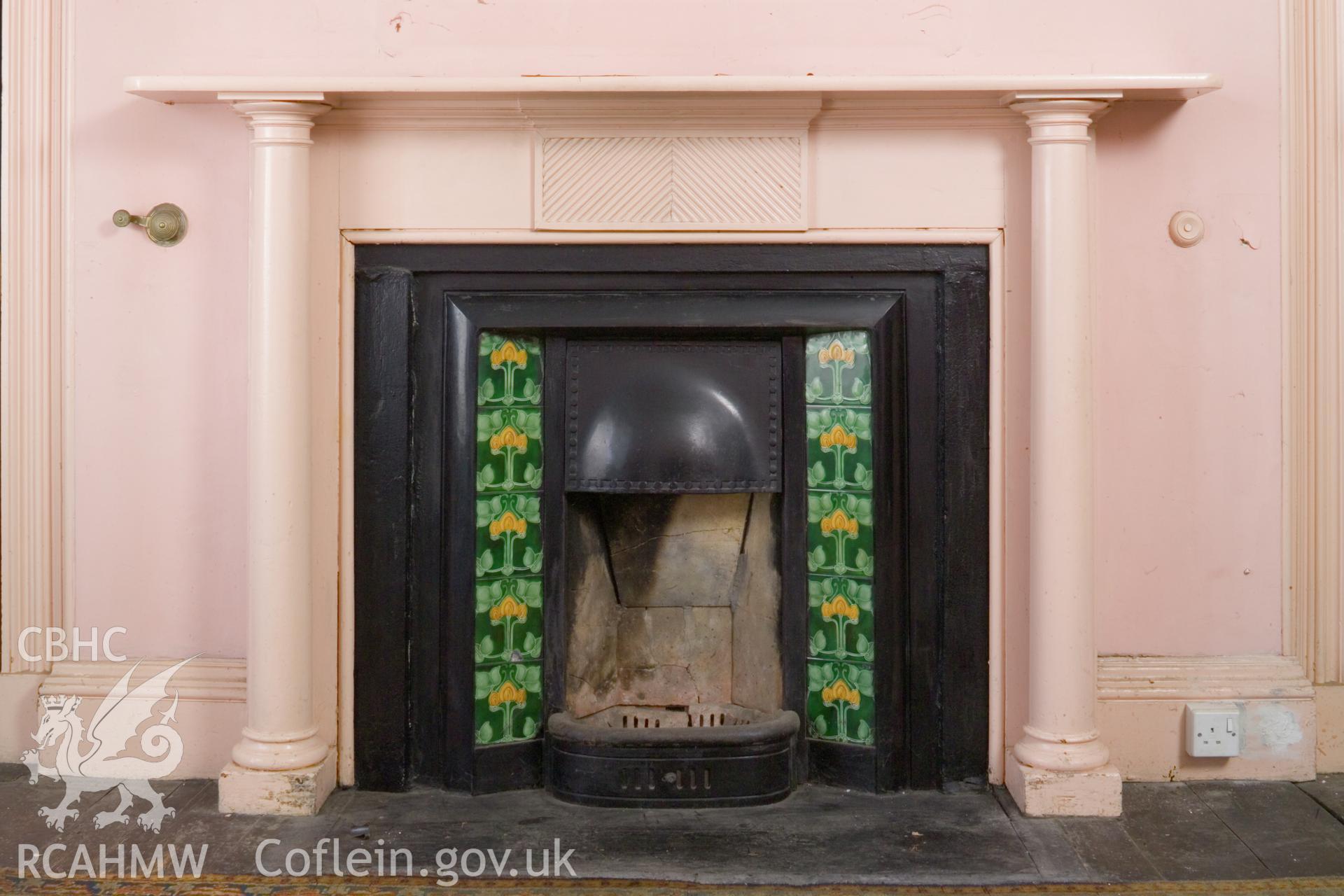 Ground floor front room, fireplace.