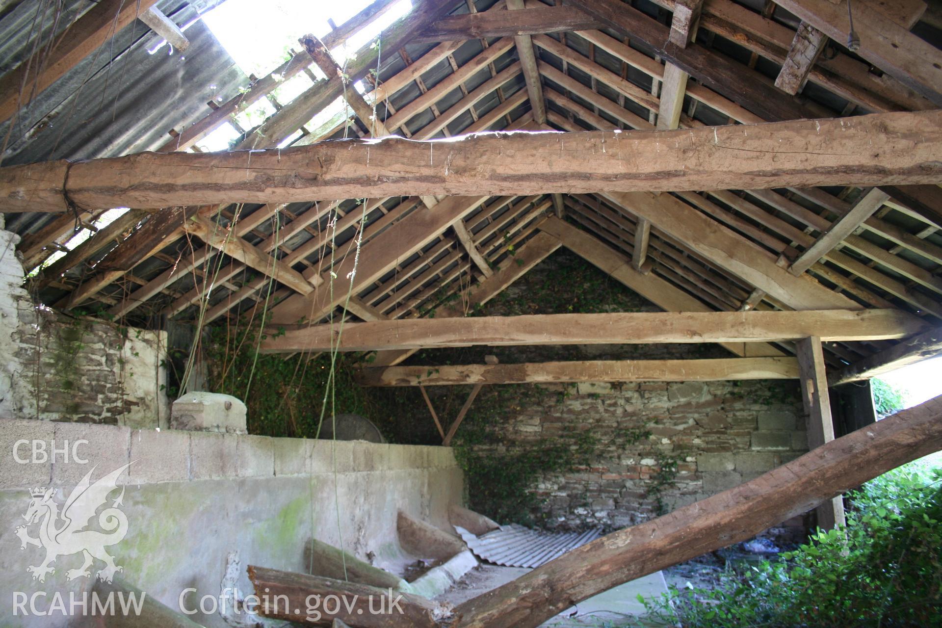 Interior  of cow-house at right angles to barn part open-fronted, at barn.