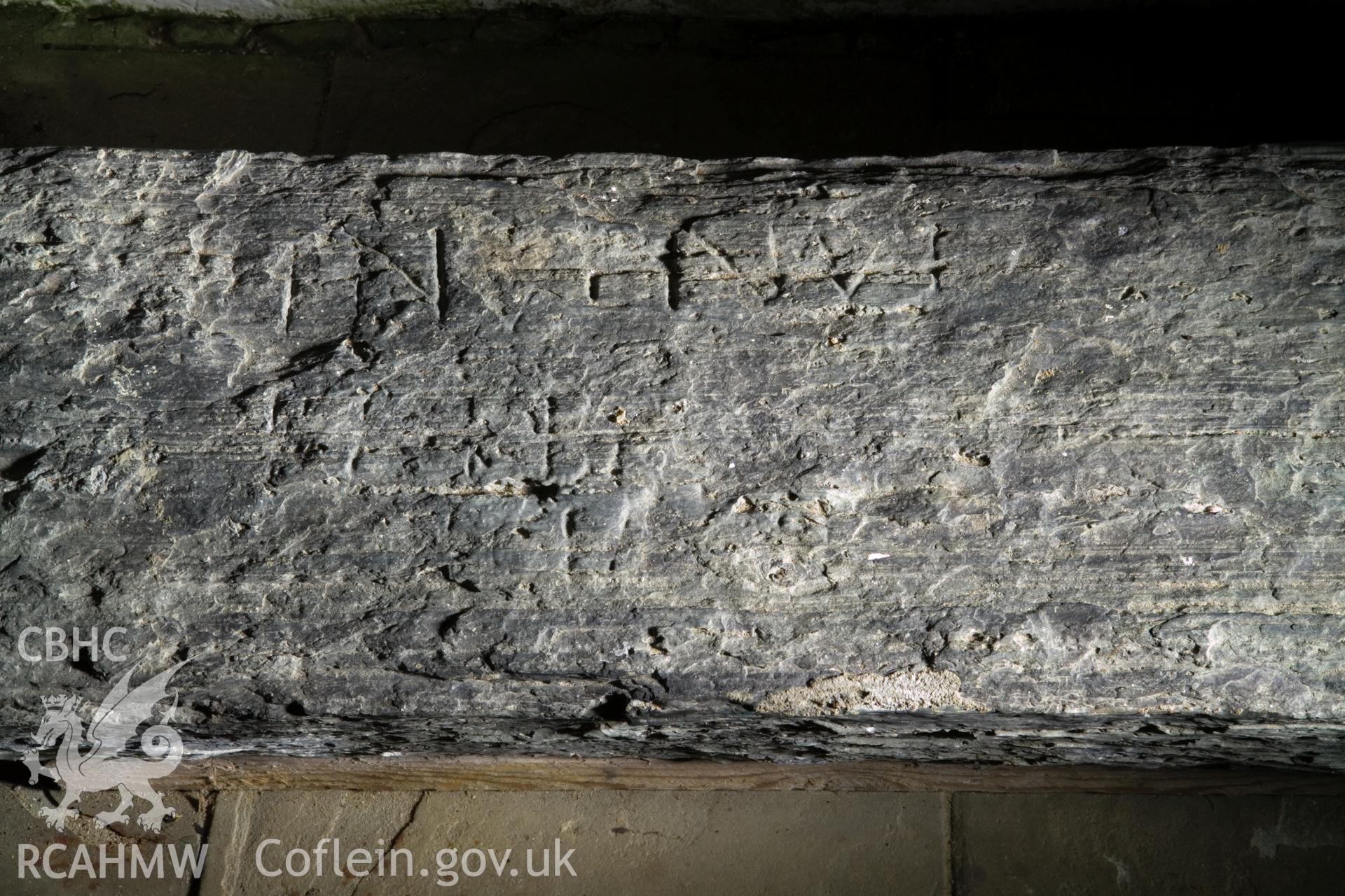 Inscribed stone against south wall, detail