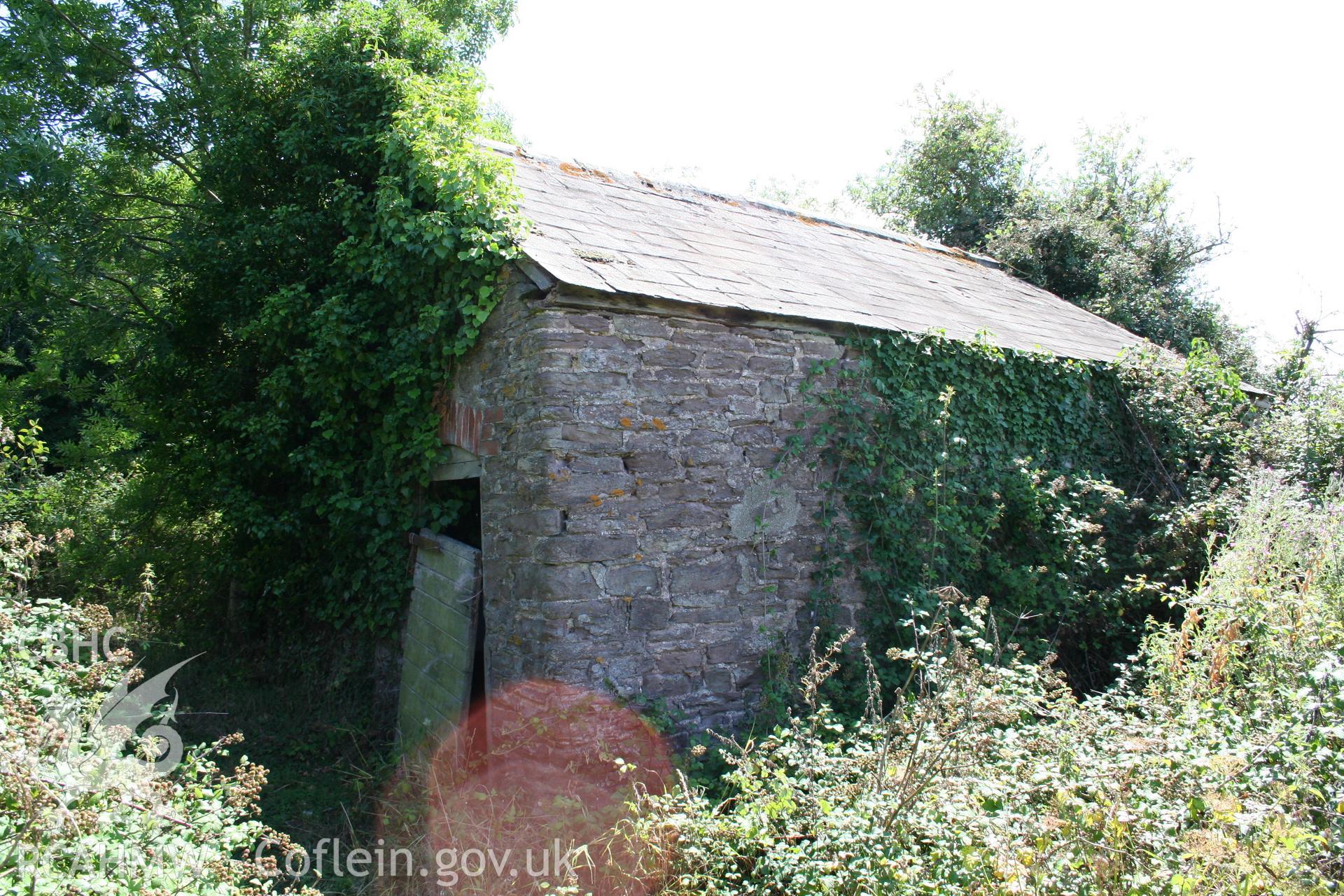 Exterior view from north of bull house in-line with open-fronted cow-house.