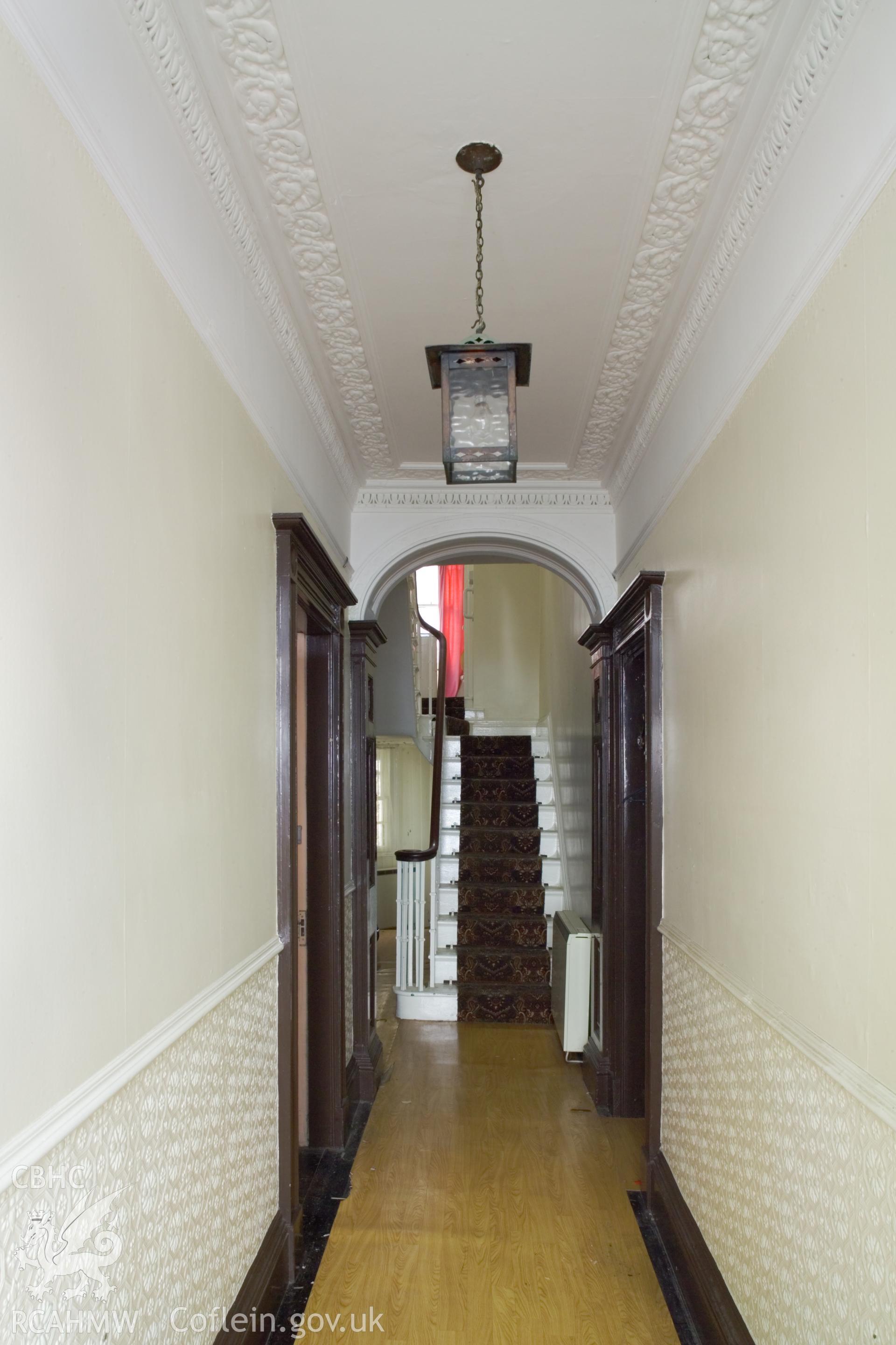 Ground floor, front passage and stairwell.