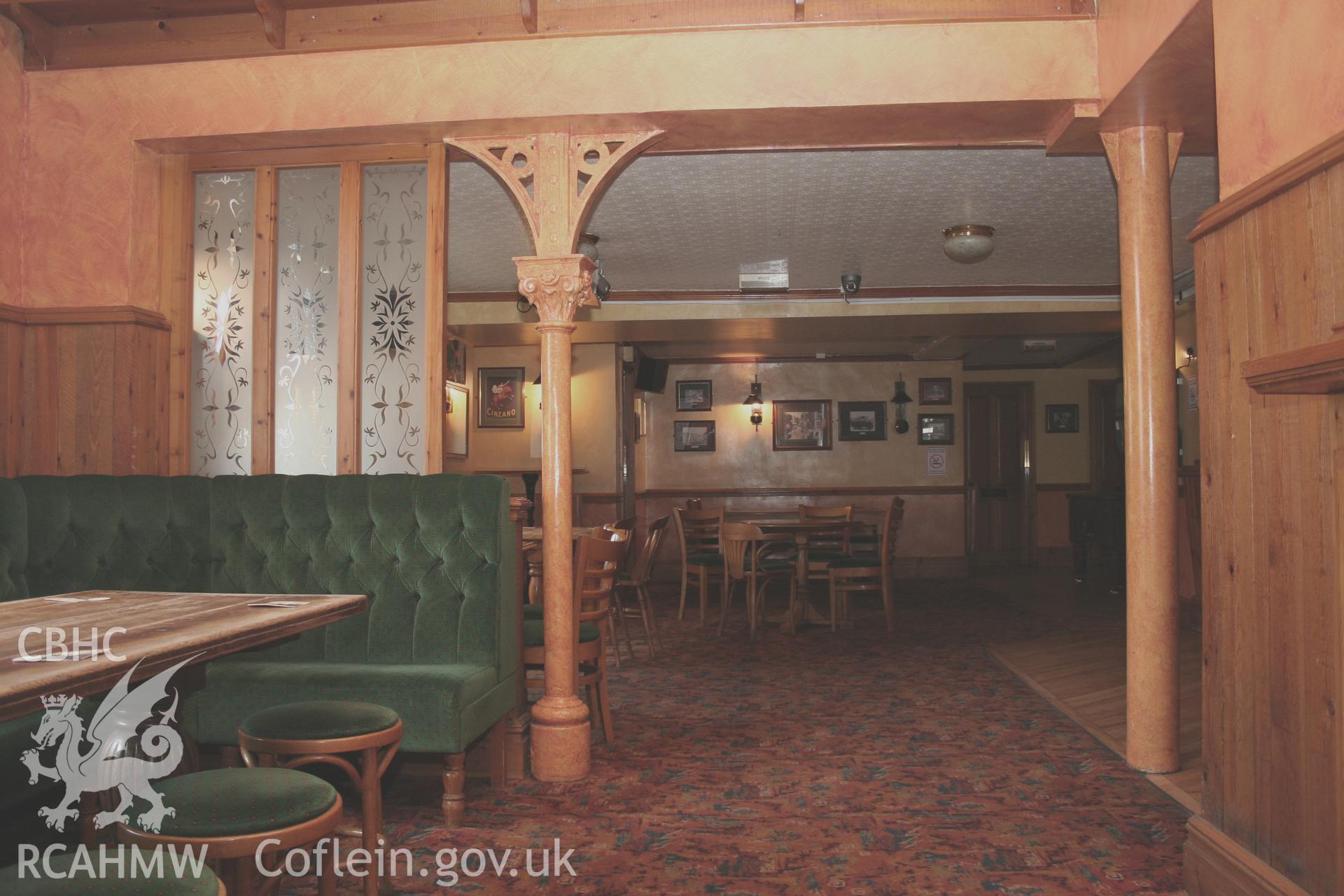 Turf Hotel, Mold Road, Wrexham. Interior, Re-set gallery column from front-room, left.