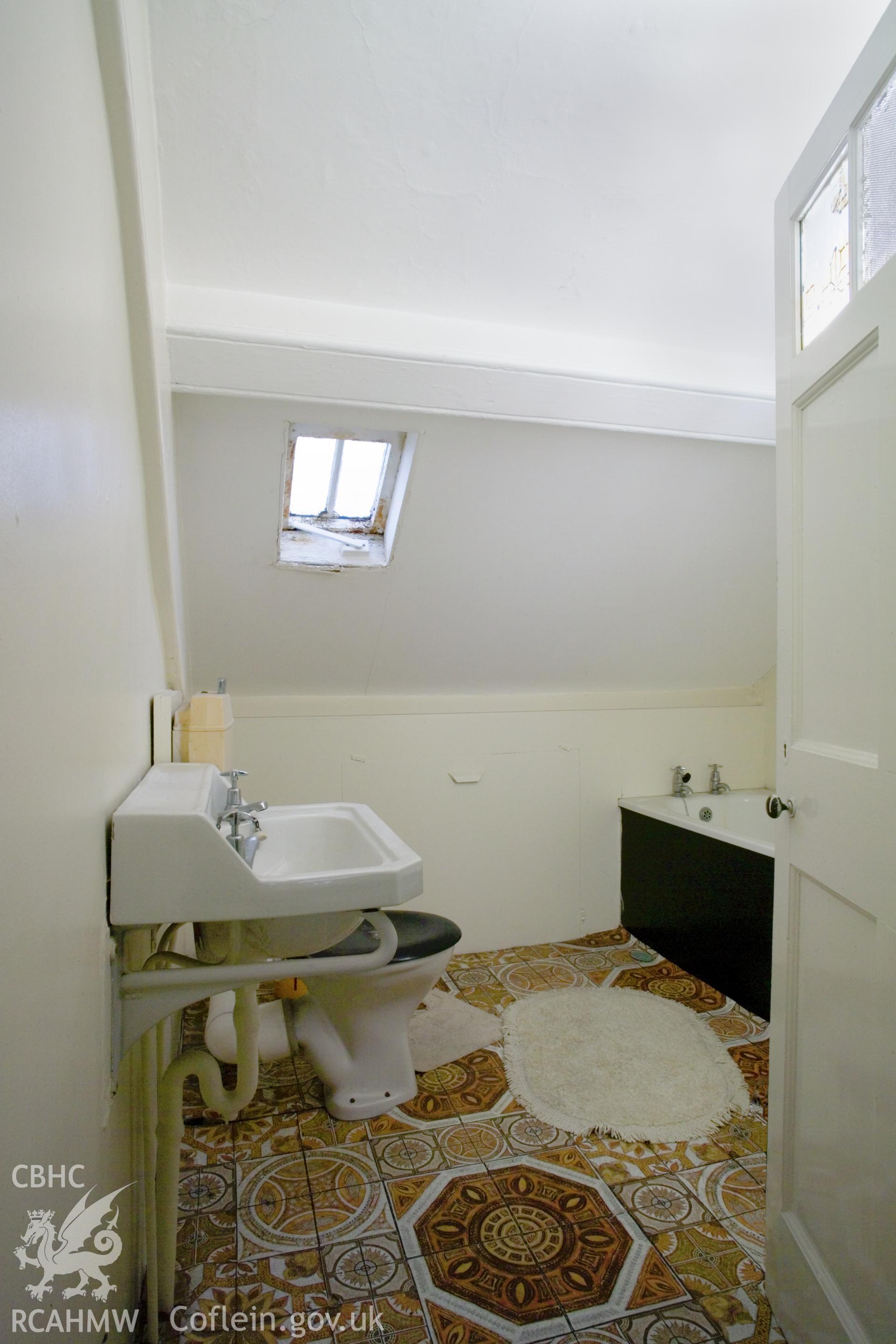 (inserted) attic bathroom.