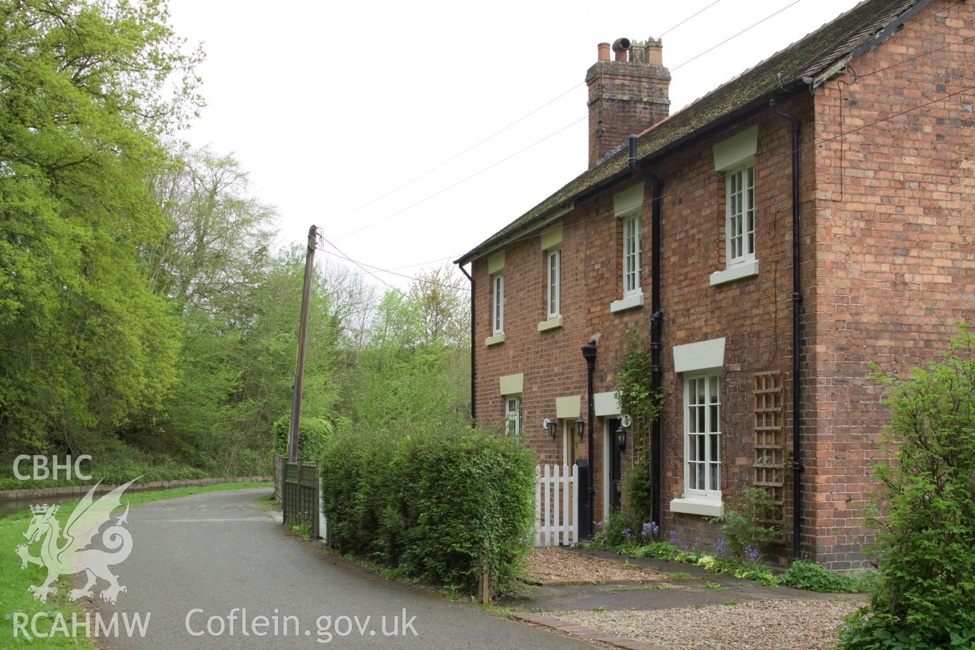 Close view of cottages from east.