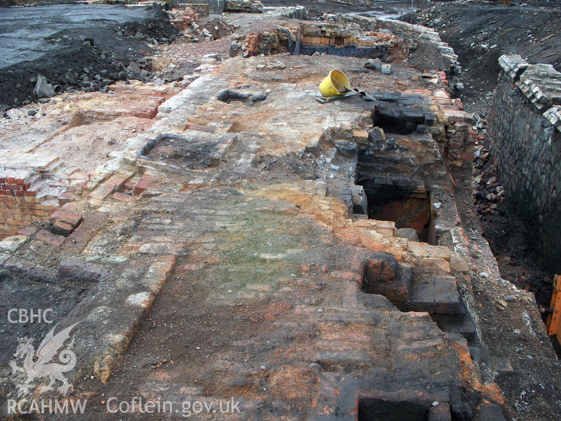 Vault-tops of gas regerative furnaces on the northern edge of the central zinc works, looking west towards river.