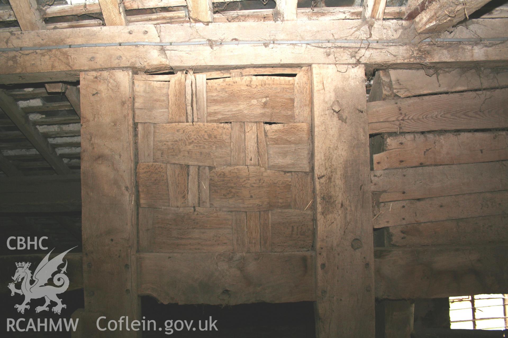 Interior, east wall-framing, detail of wattle infill.