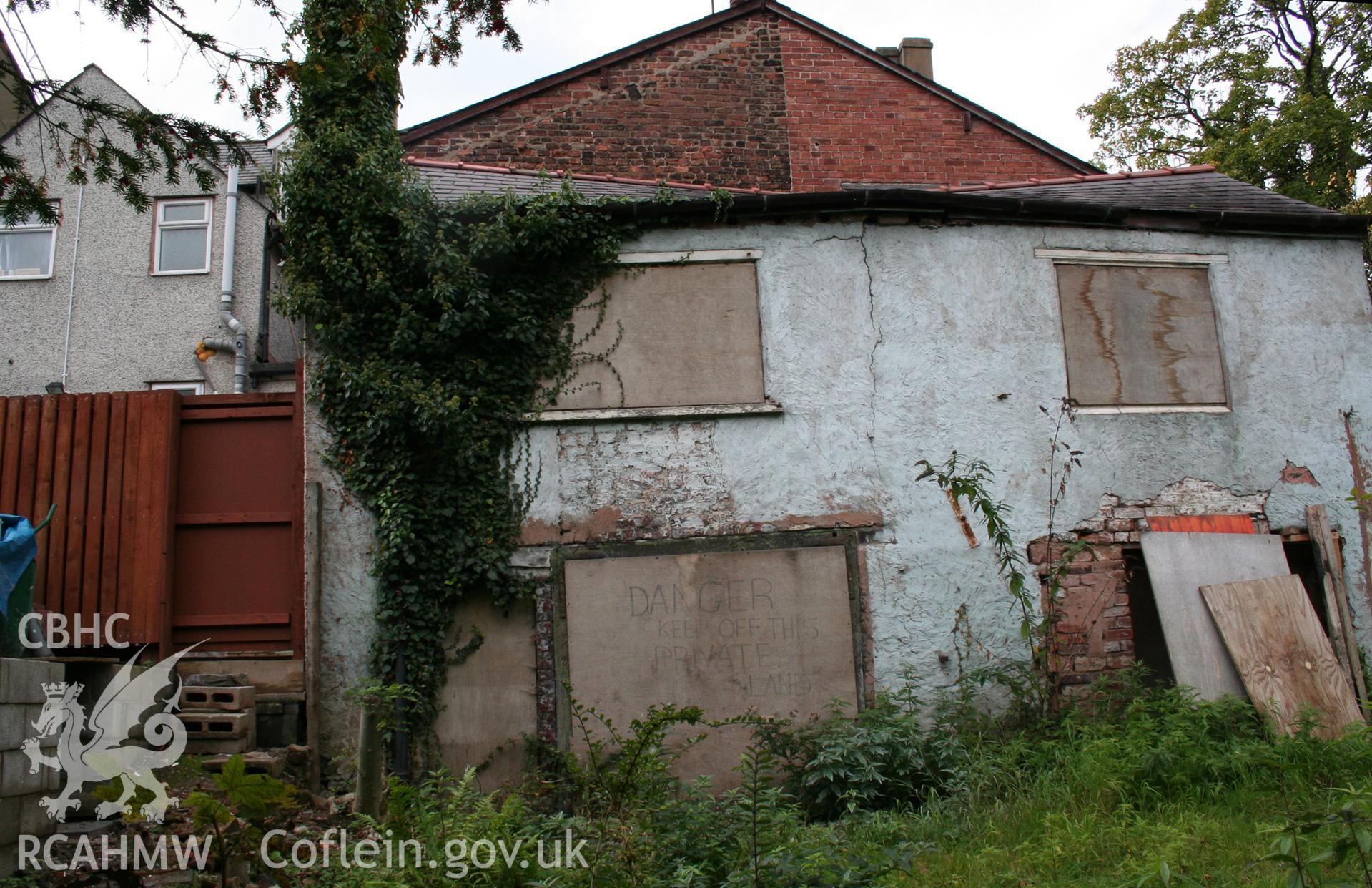 Exterior coach-house west elevation