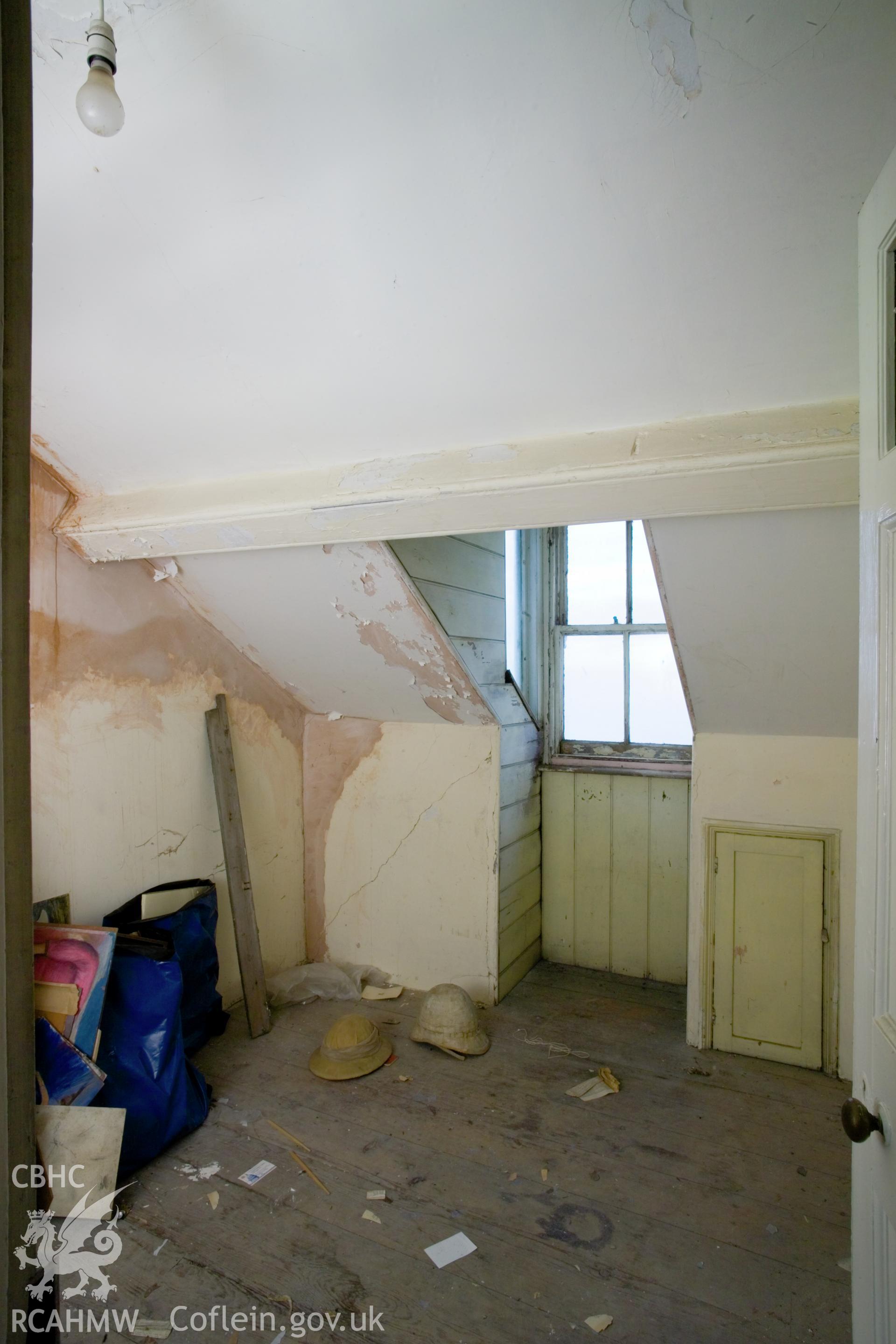 Front, south, attic room.