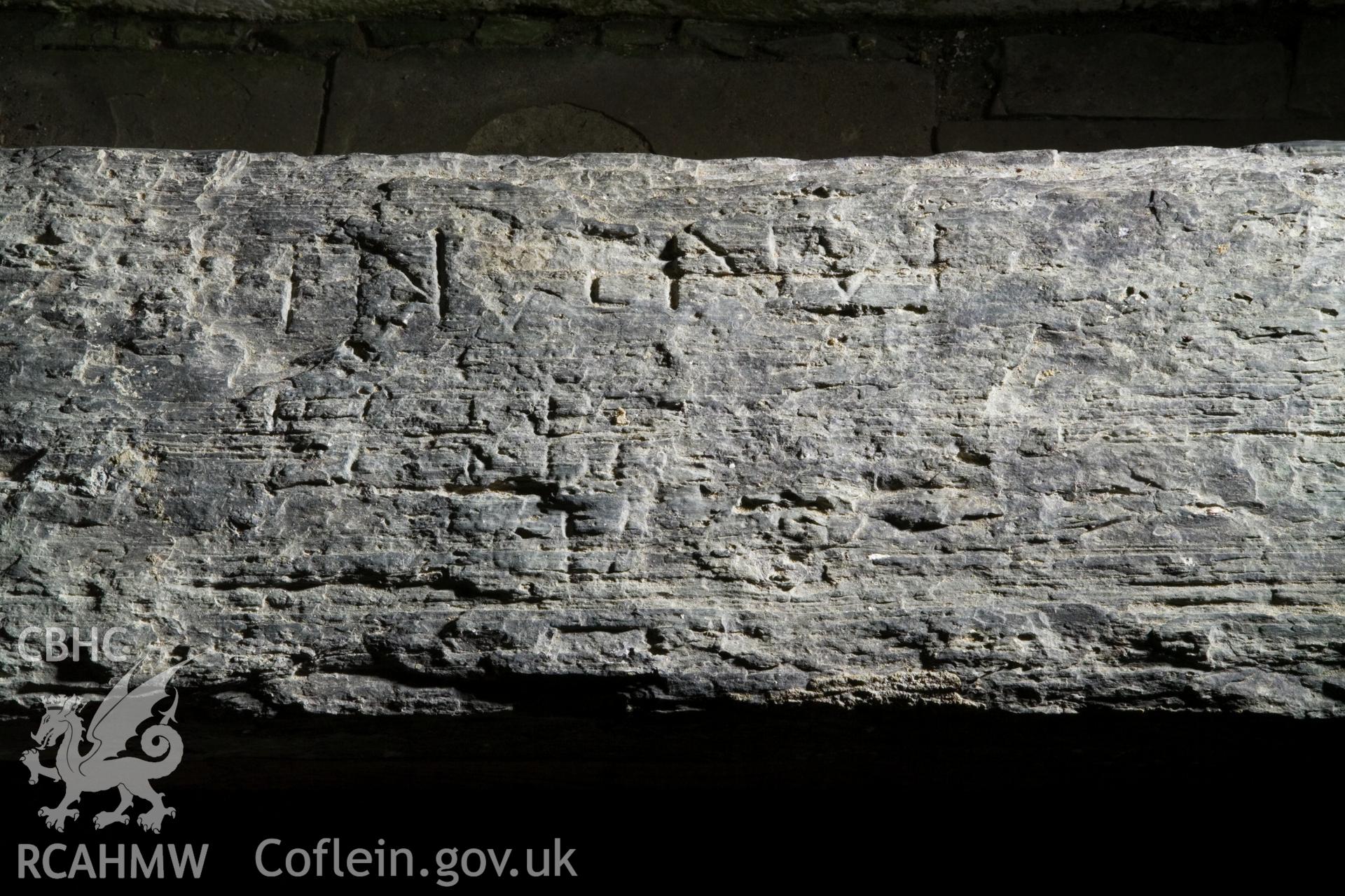 Inscribed stone against south wall, detail