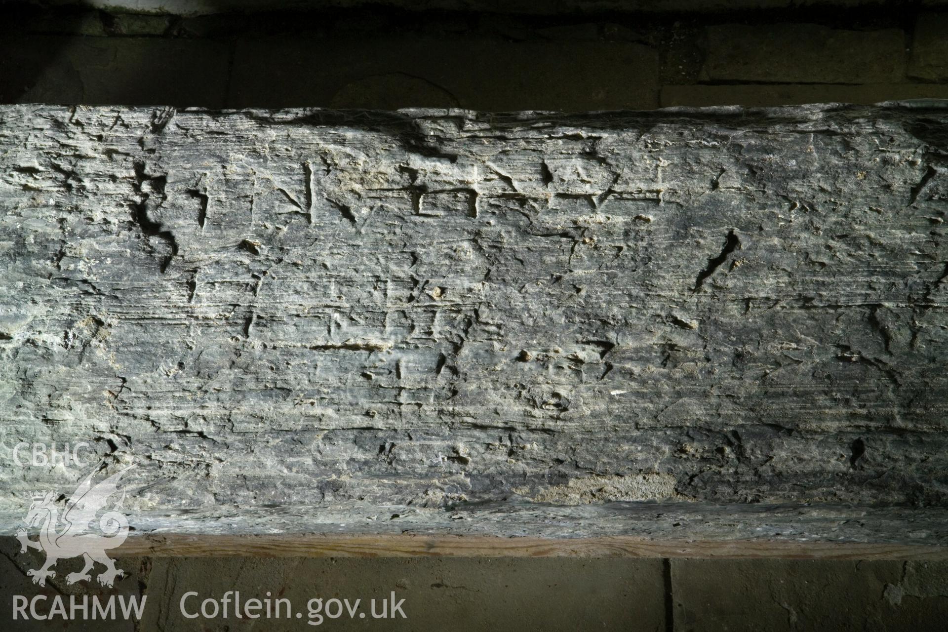 Inscribed stone against south wall, detail