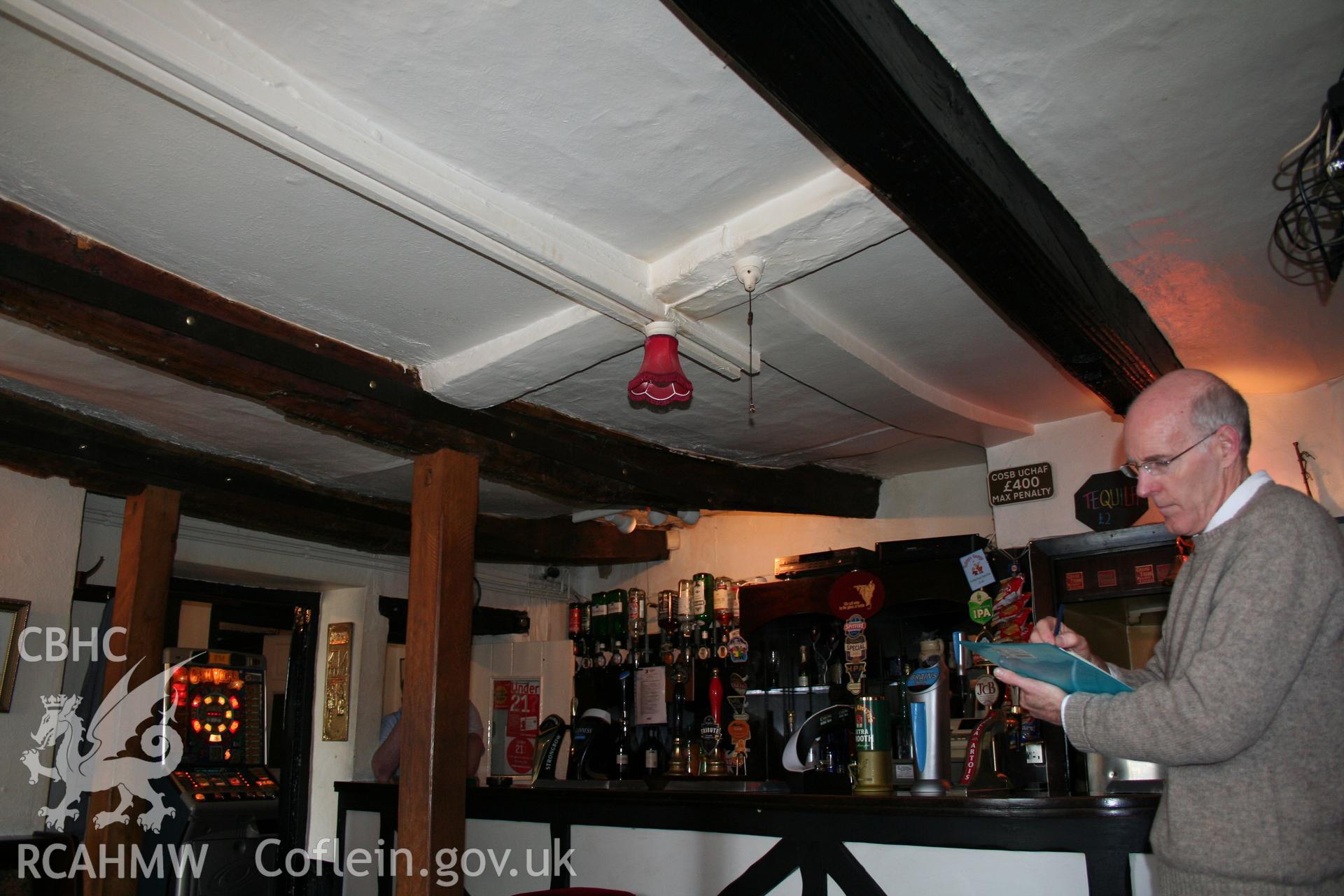 The King's Arms, Abergavenny. Interior, right unit plain chamfered ceiling-beams.