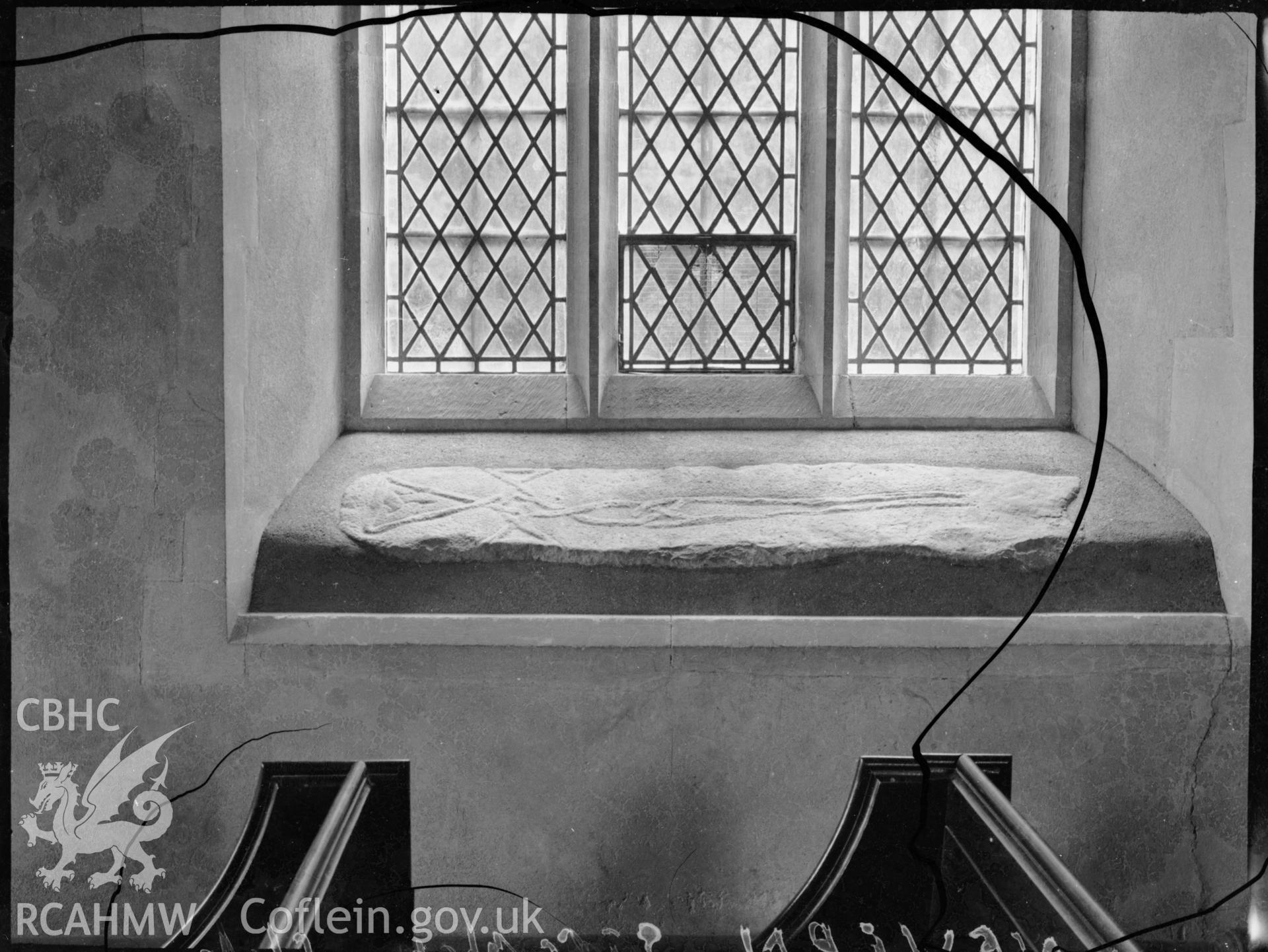 Black and white photo showing inscribed cross on the window ledge at St Brynach's Church, Nevern.