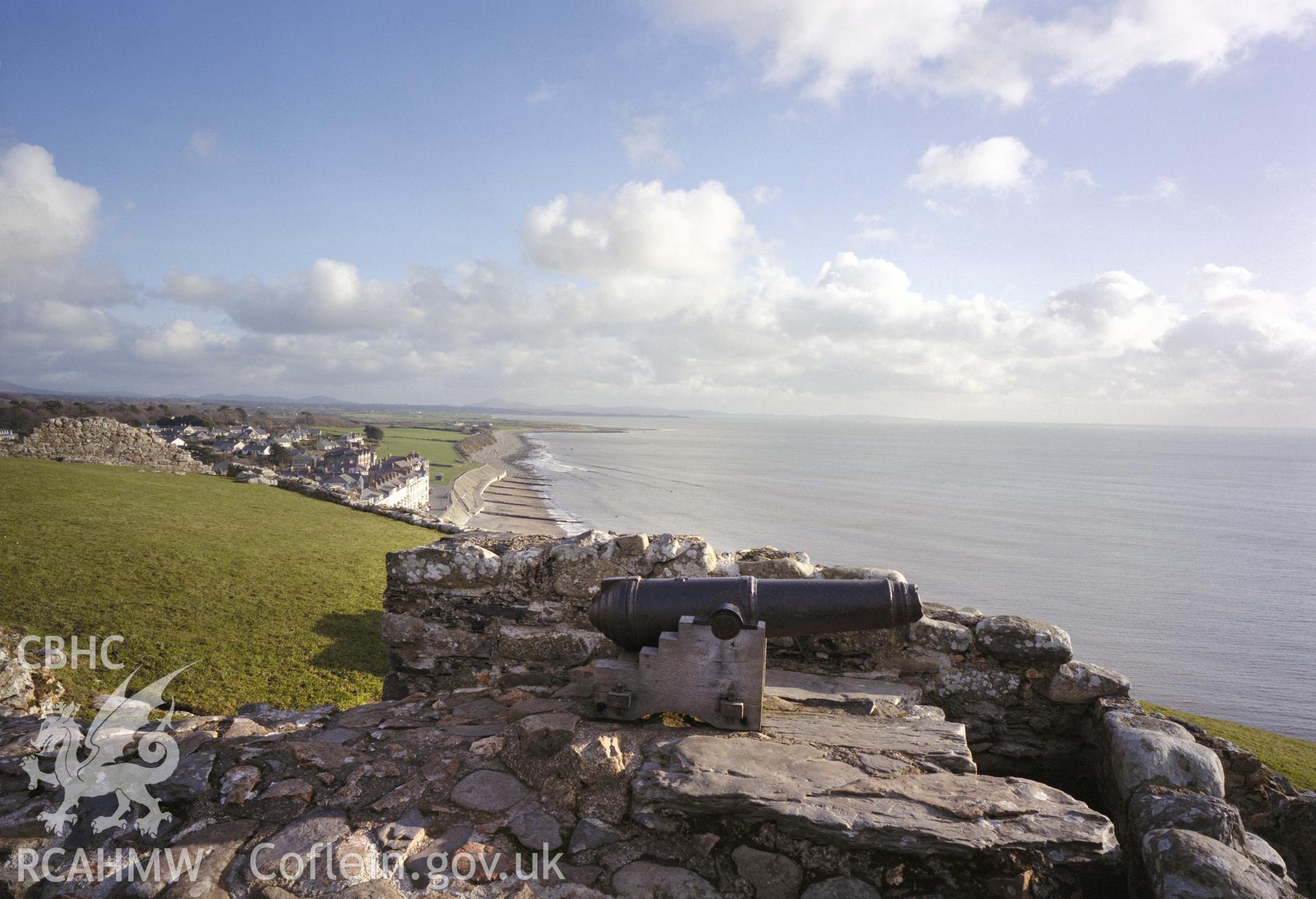 View of Criccieth castle cannon and seafront