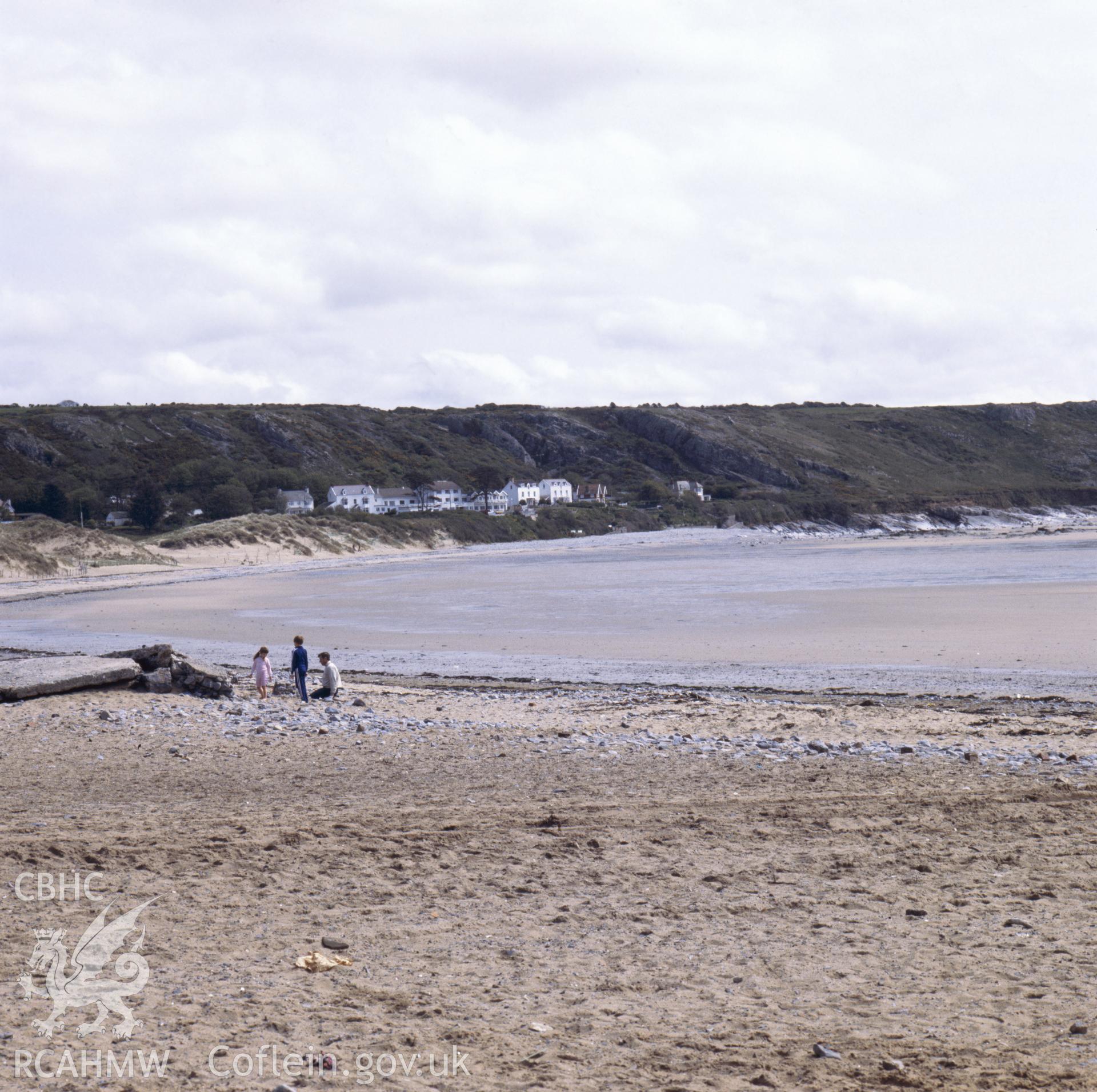 1 colour transparency showing view of the beach near Weobley castle; collated by the former Central Office of Information.