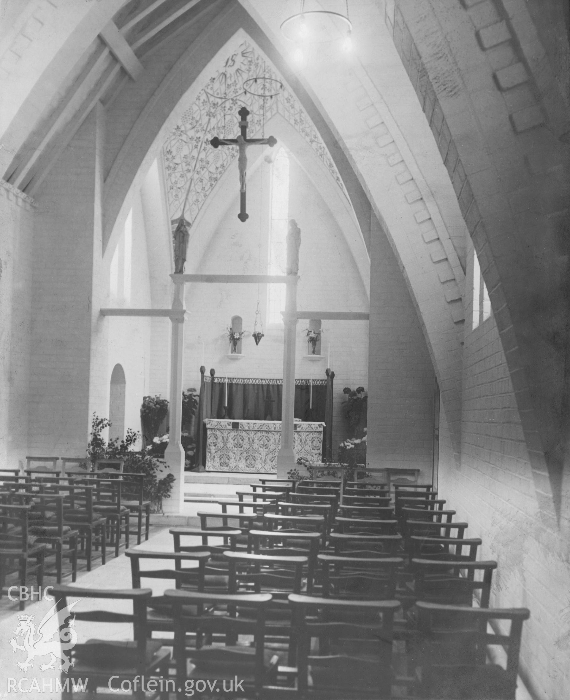 Large mounted black and white print of the interior of the Bangor Church Hostel Chapel, designed by North and Padmore Architects. Copy negative held.