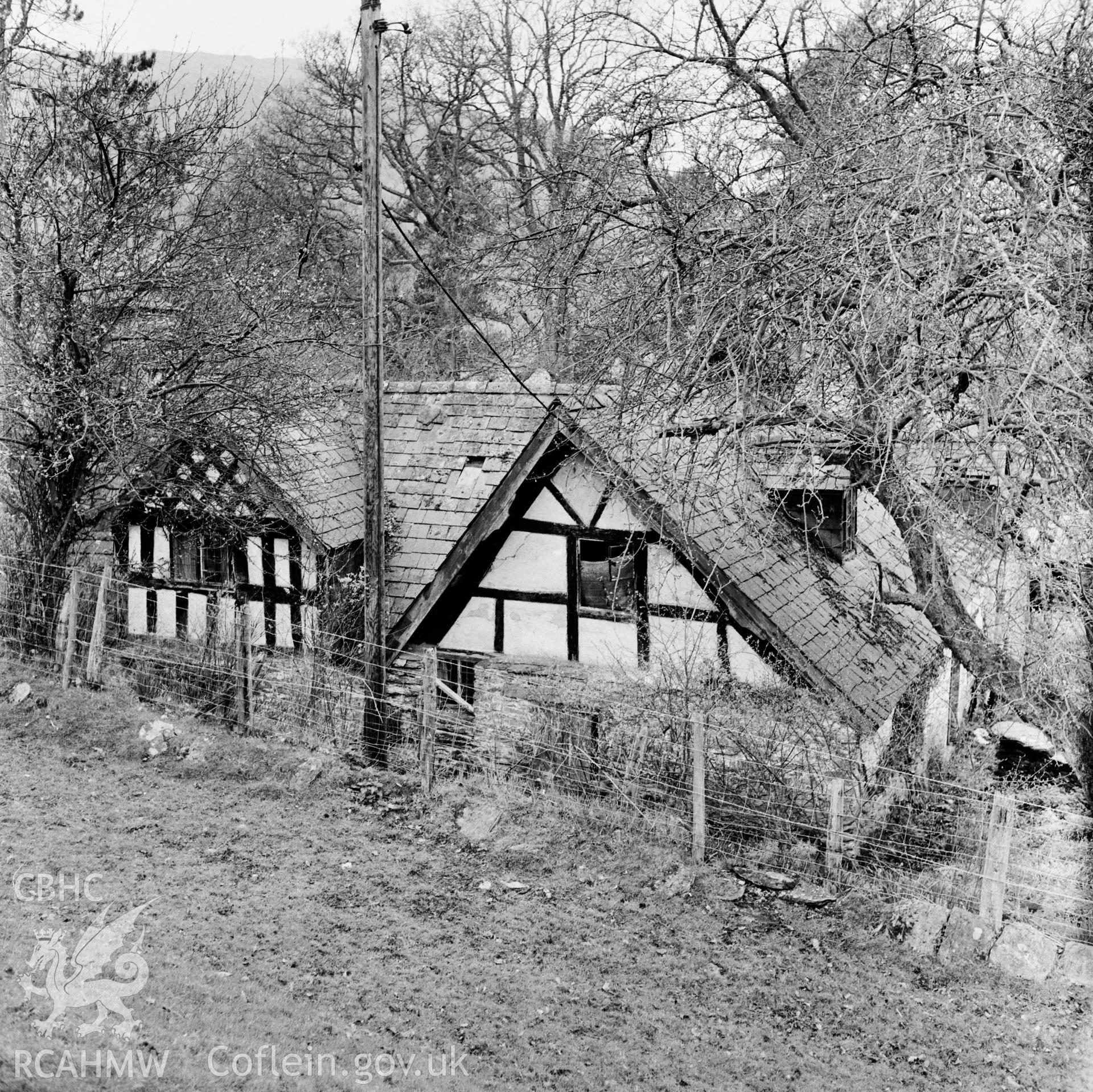 Exterior view of farmhouse showing rear elevation