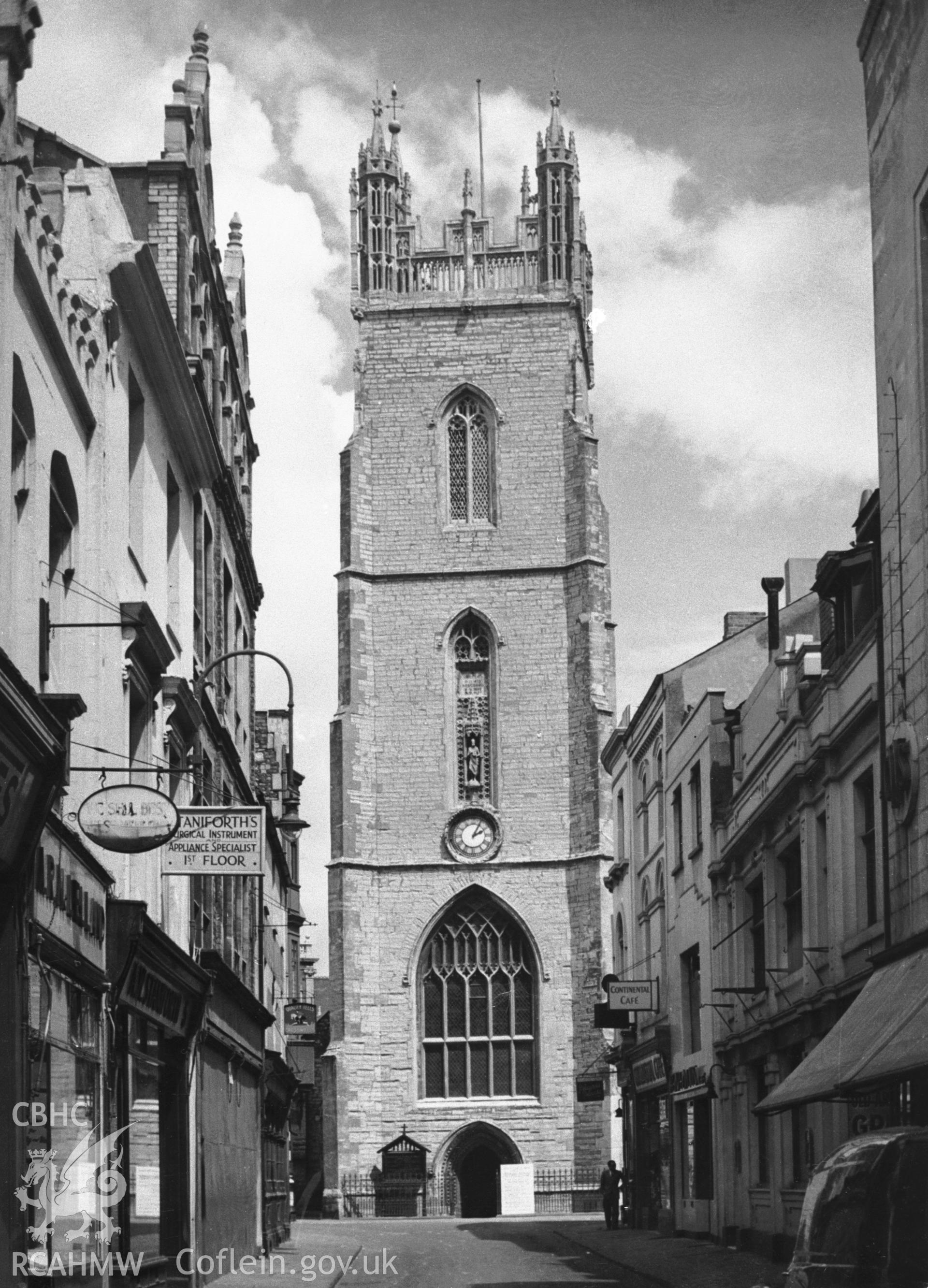 Black and white print of St John the Baptist's Church, Cardiff, showing view from street. Undated but before 16/12/1953.