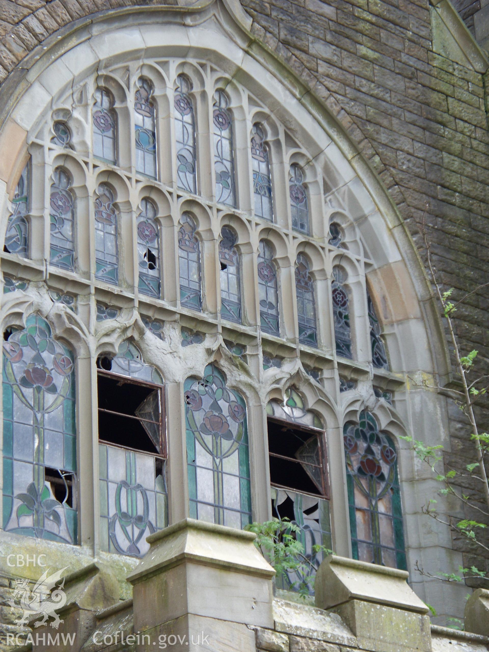 Main perpendicular tracery window over the NW entrance.