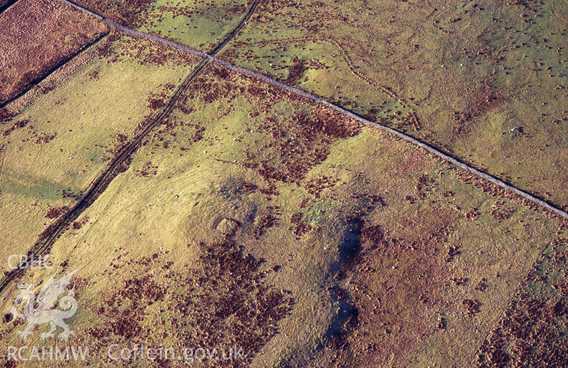 RCAHMW colour oblique aerial photograph of Fortlet. Taken by C R Musson on 12/04/1995