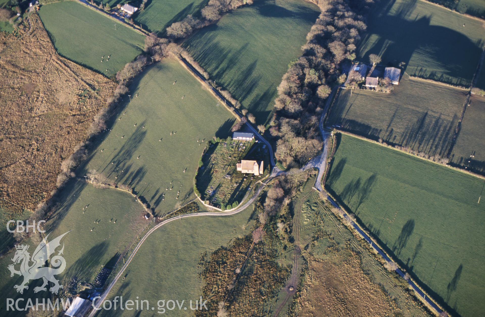 Slide of RCAHMW colour oblique aerial photograph showing the church at Tyn y Graig, taken by T.G. Driver, 2001.