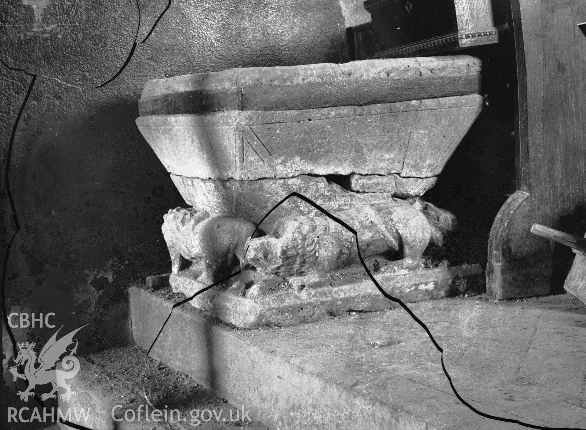 Black and white photo showing the font at Llanarth Church.