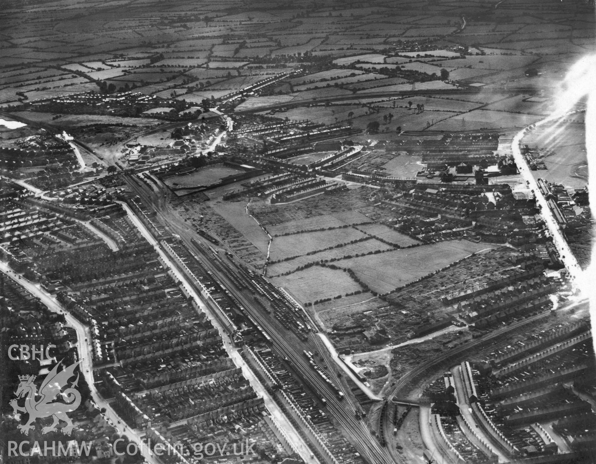 Black and white aerial photograph, dated 1937, showing a site in Newport on which the Newport Royal Ordnance Factory was built in 1940. Aerofilms album Monmouth N-Pe (448).