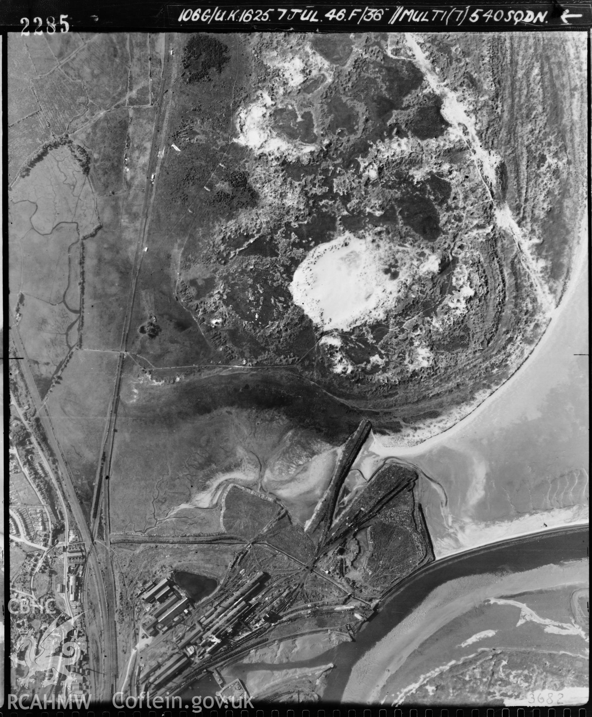 Black and white vertical aerial photograph taken by the RAF on 07/07/1946 centred on SS73469242 at a scale of 1:10000. The photograph includes part of Baglan Bay community in Neath, Port Talbot.
