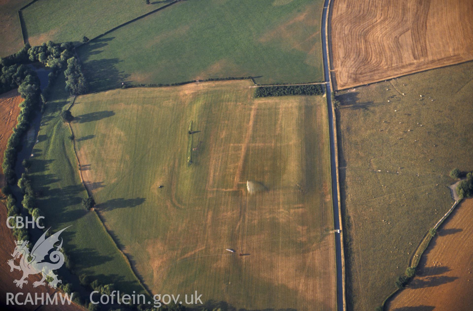 Slide of RCAHMW colour oblique aerial photograph of Forden Gaer Roman Fort, taken by C.R. Musson, 8/8/1990.