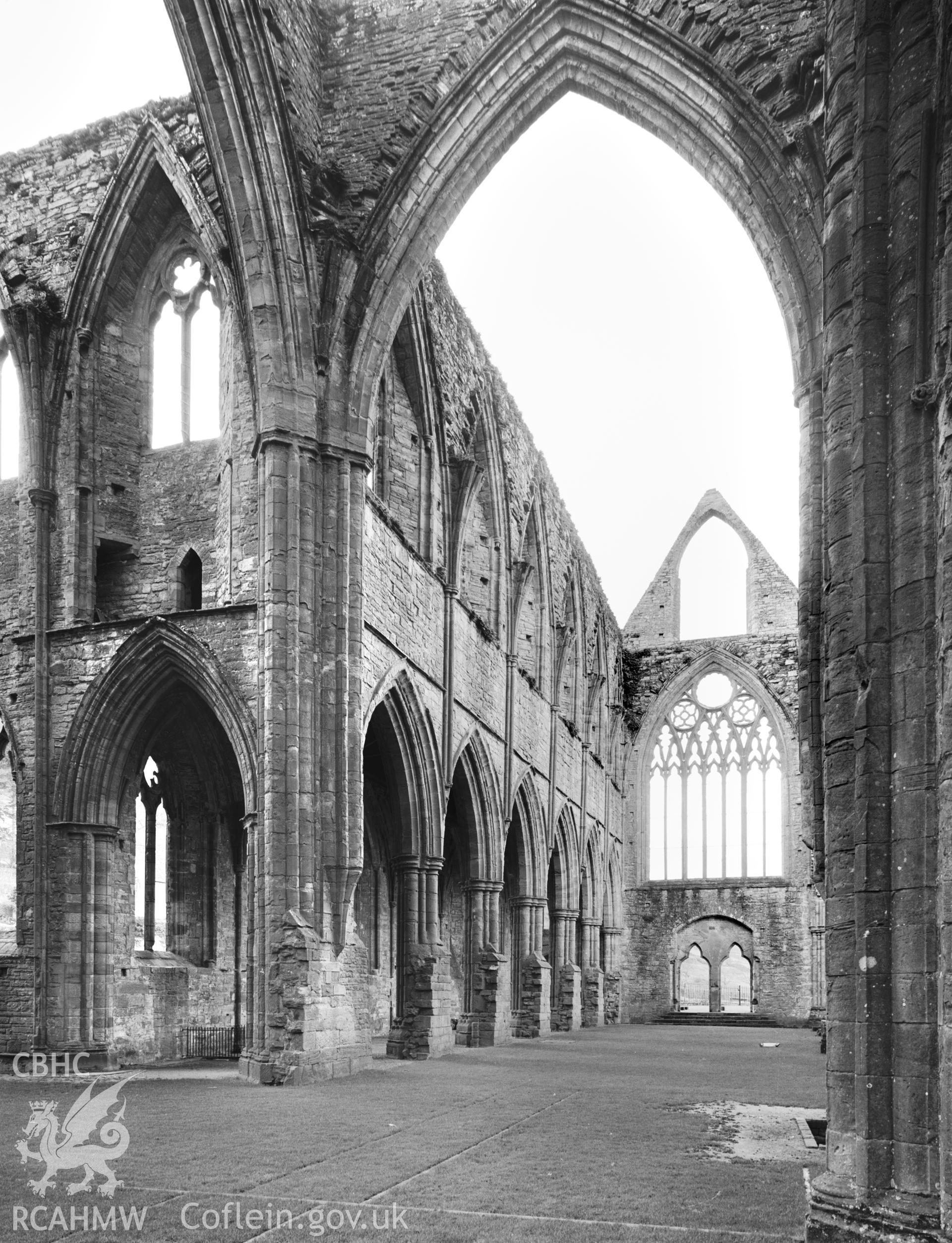 1 b/w print showing exterior view of Tintern Abbey; collated by the former Central Office of Information.