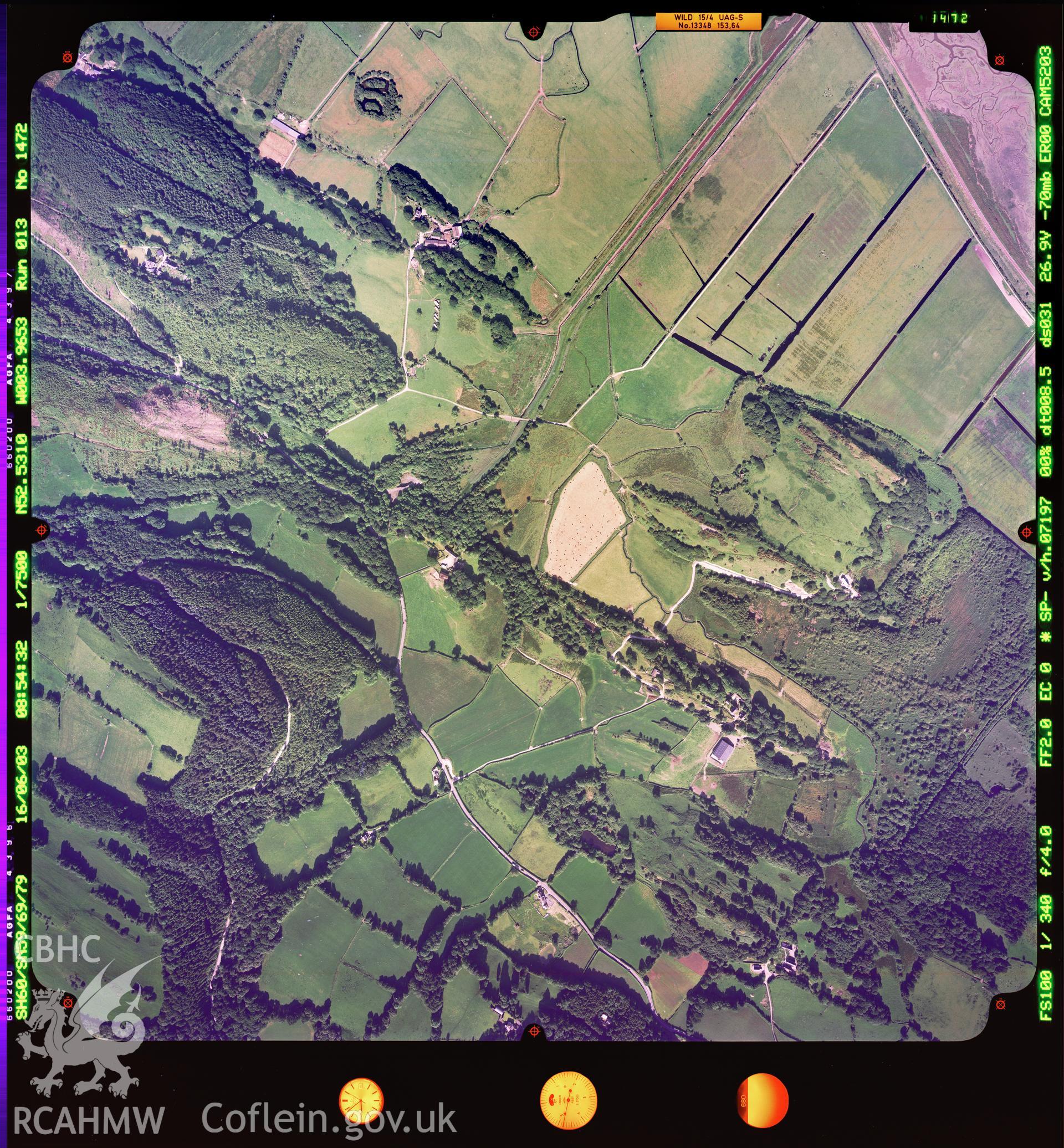 Digitized copy of a colour aerial photograph showing the area around Ysgubor y Coed, Ceredigion, taken by Ordnance Survey, 2003.