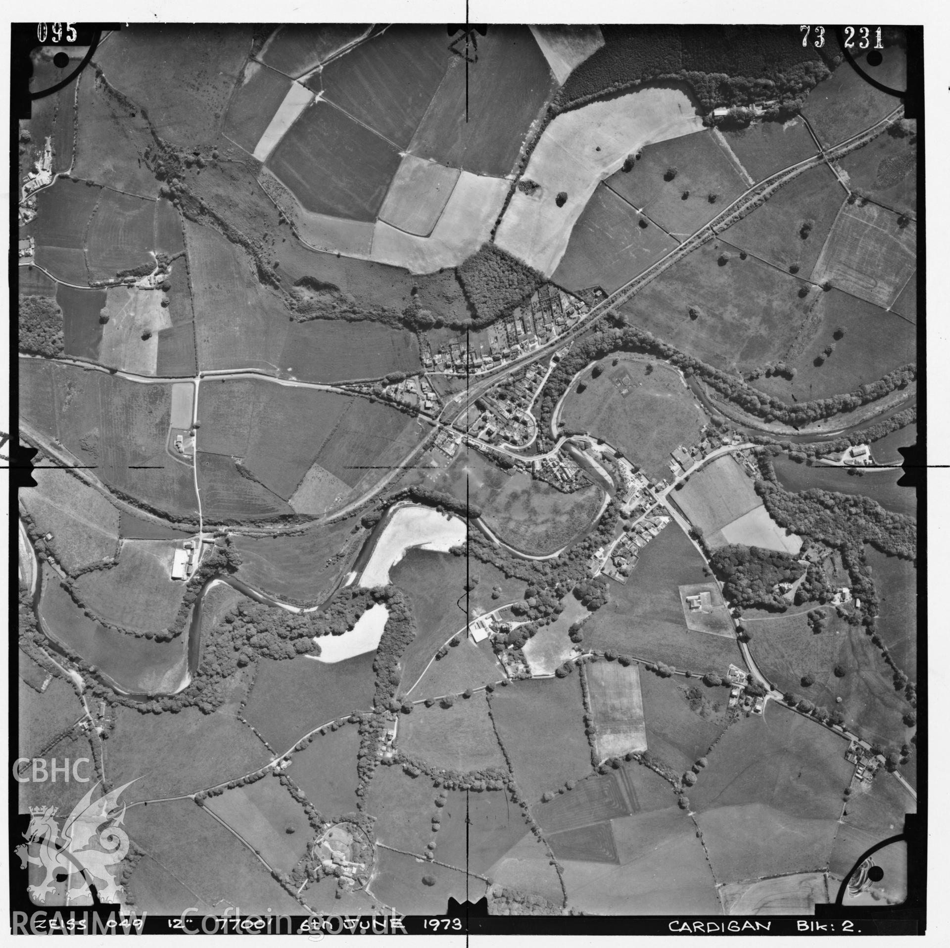 Digitized copy of an aerial photograph showing the village of Llanfarian and surrounding area, taken by Ordnance Survey, 1973.