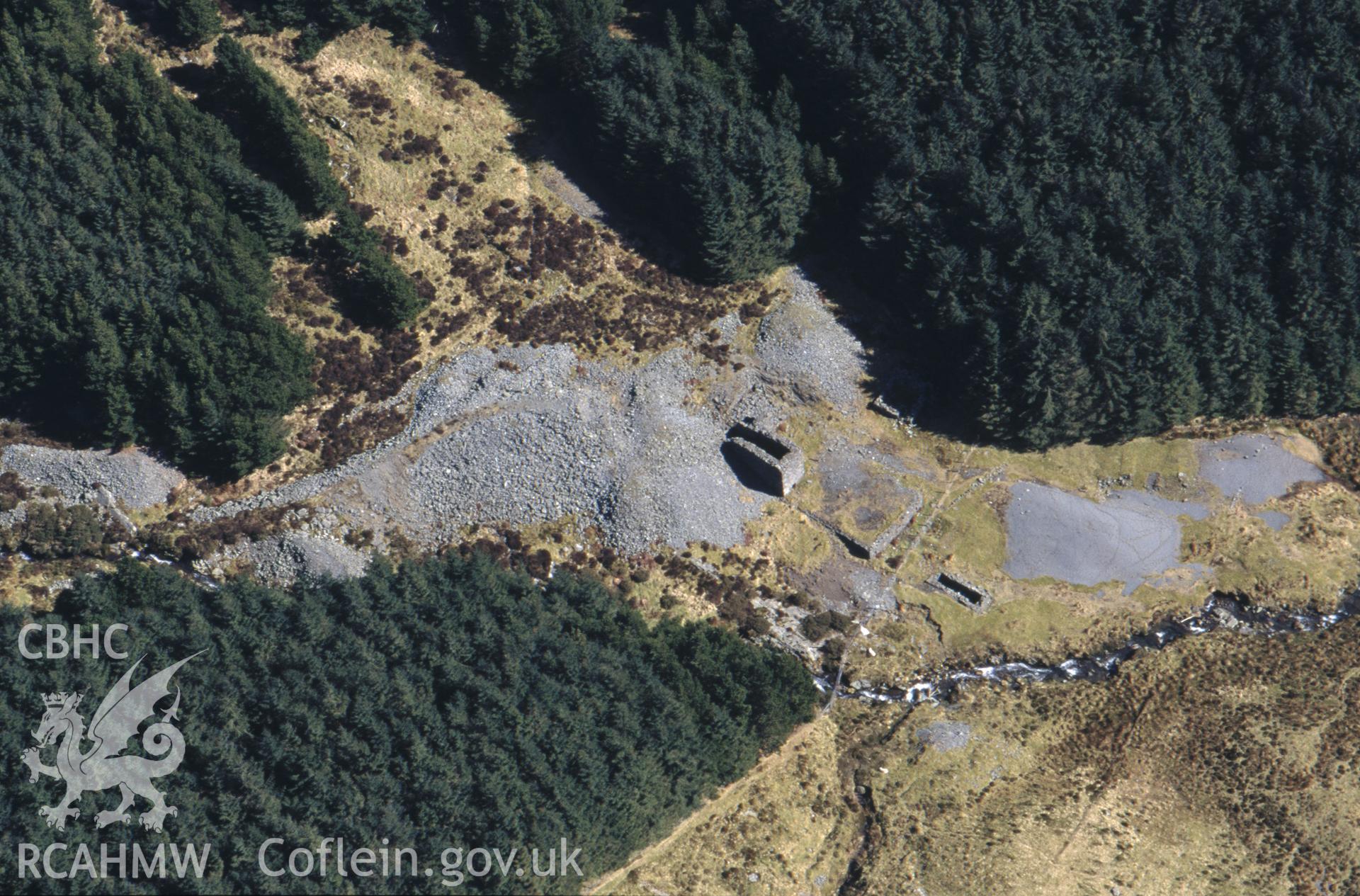 RCAHMW colour oblique aerial photograph of poss. SN7984. Taken by C R Musson on 23/03/1995
