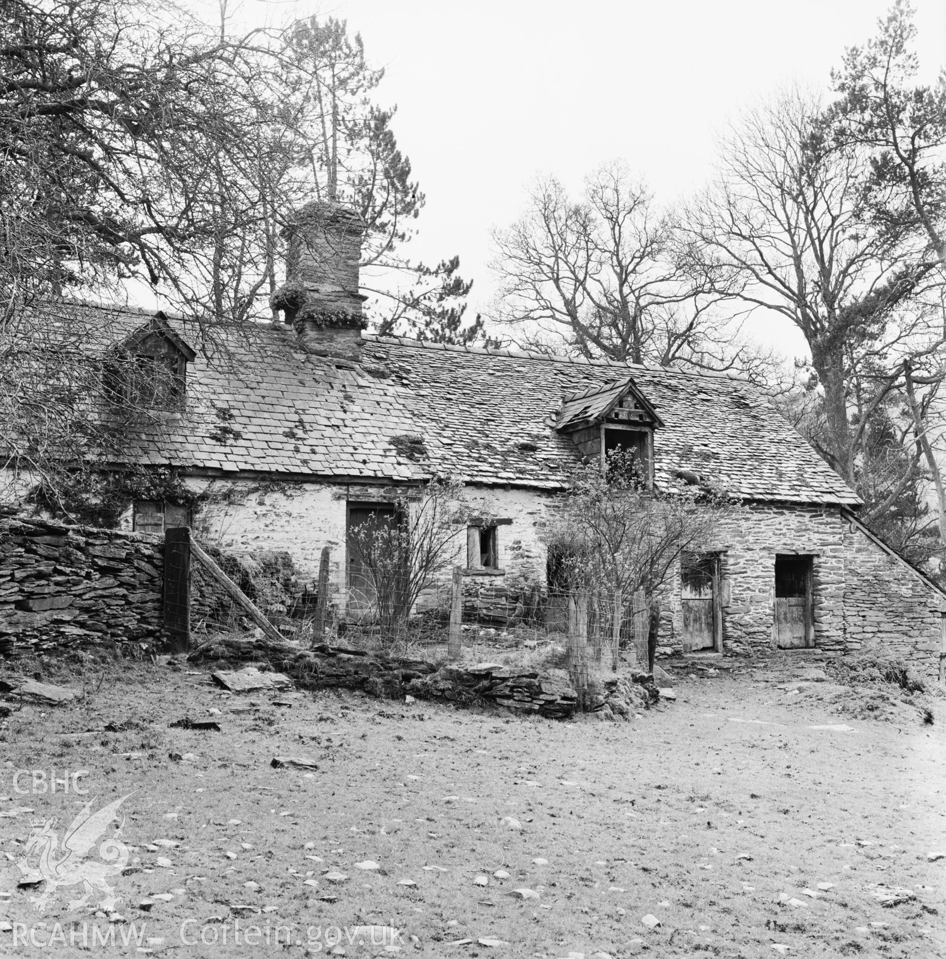 Exterior view of farmhouse showing main elevation