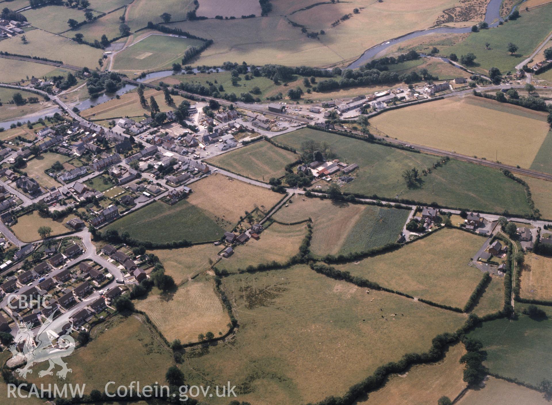 RCAHMW colour oblique aerial photograph of Caersws Roman Fort, taken by C R Musson, 1989.