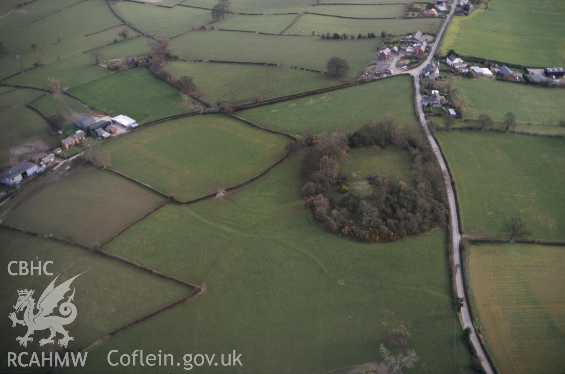 RCAHMW colour slide oblique aerial photograph of Hen Domen, Montgomery, taken on 14/03/1999 by CR Musson