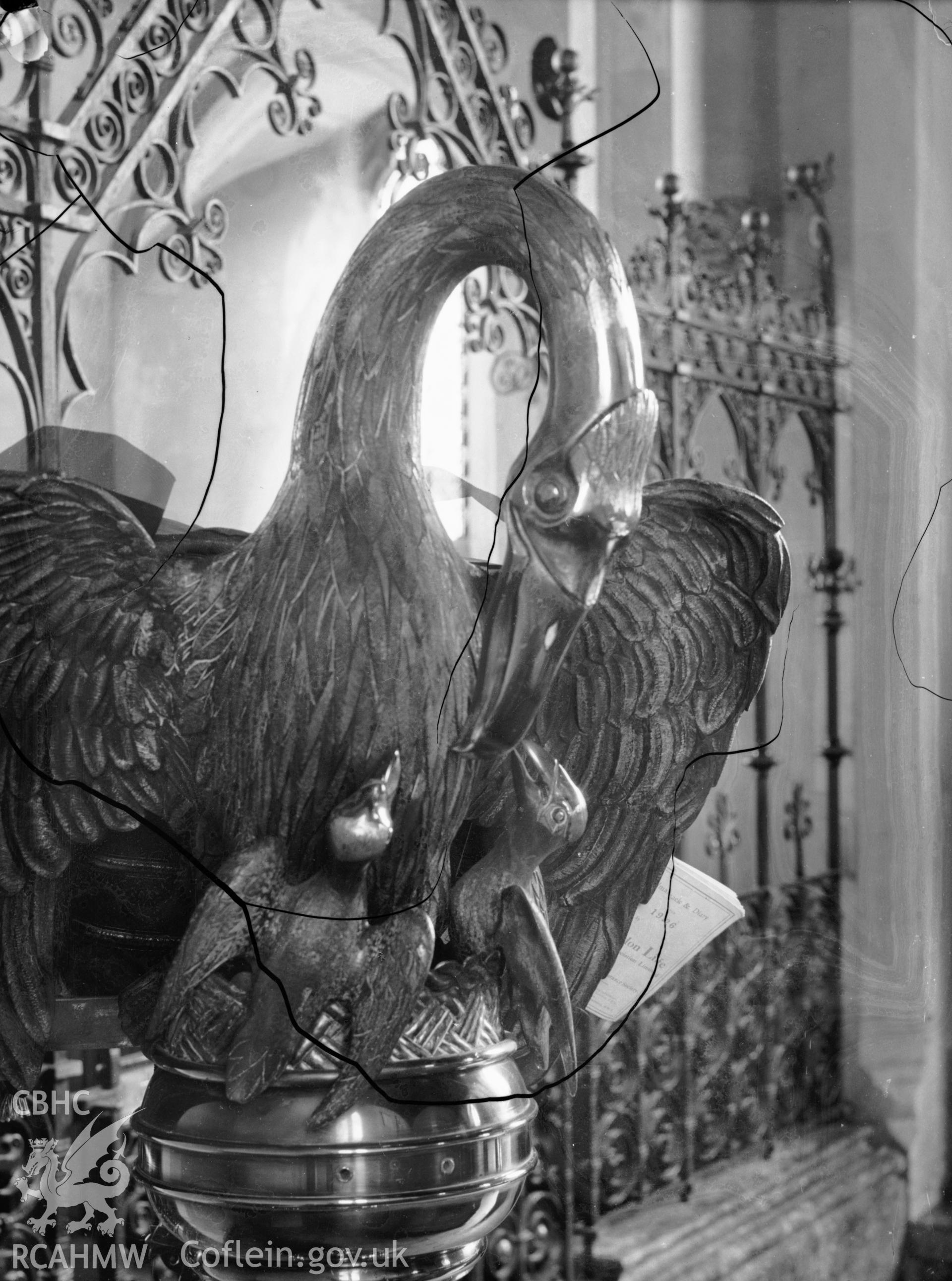 Black and white photo showing decorative cast bird at Llandyfaelog Church.