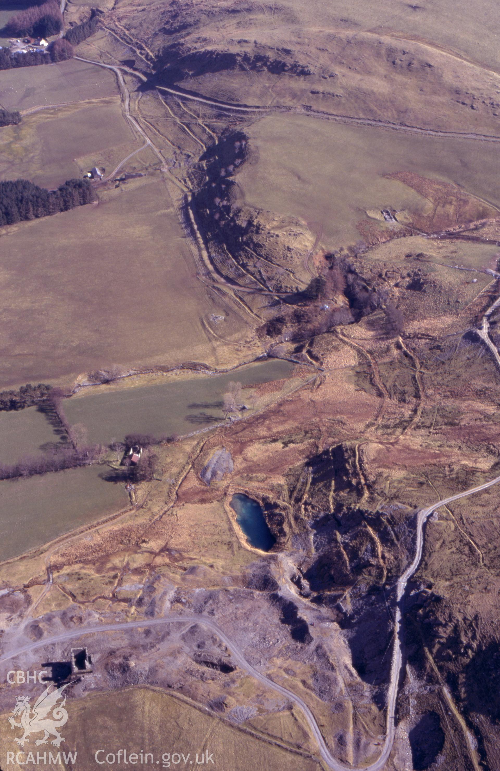 RCAHMW colour oblique aerial photograph of Castell mine taken on 23/03/1995 by C.R. Musson