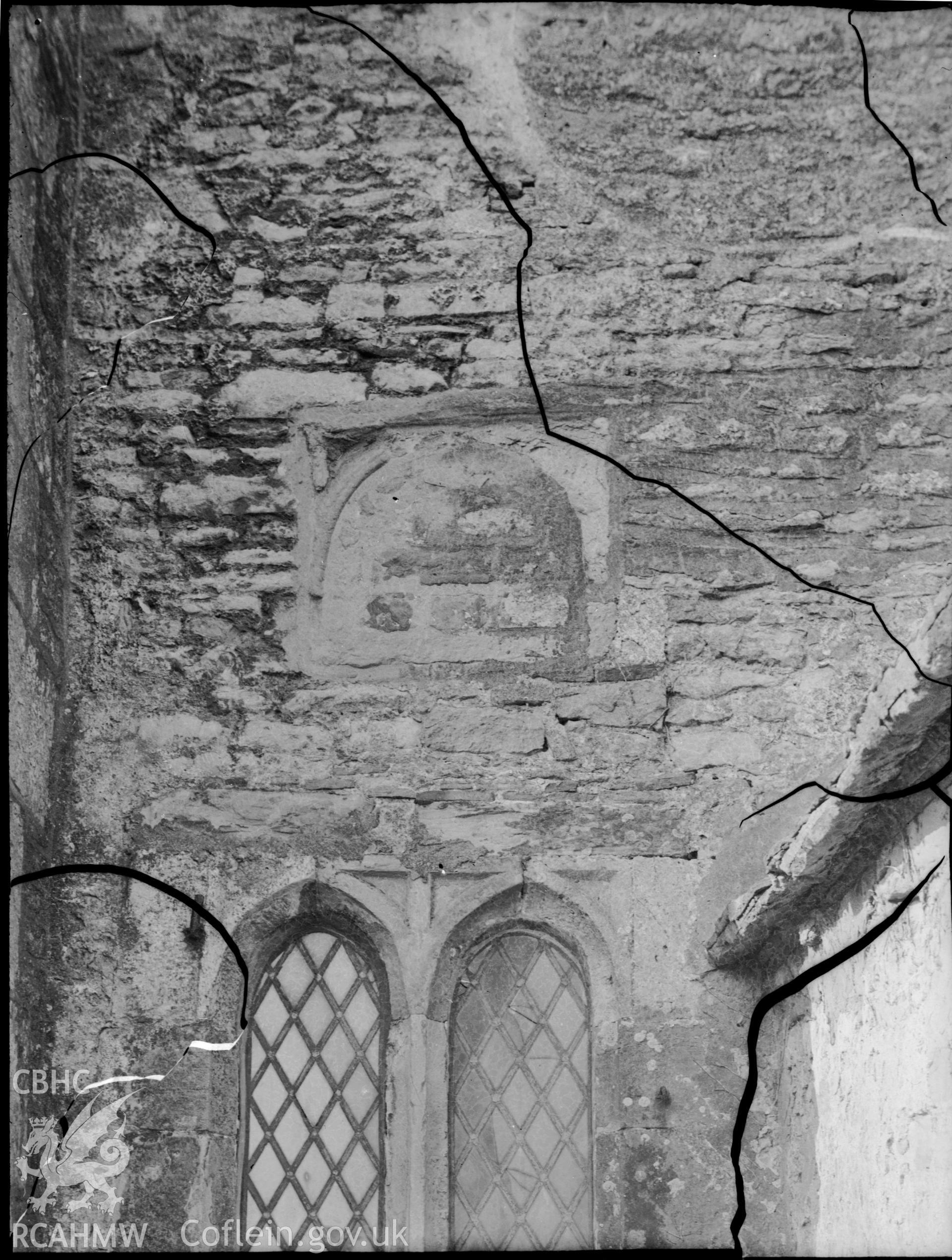 Black and white photo showing exterior wall at Gileston(?) Church.