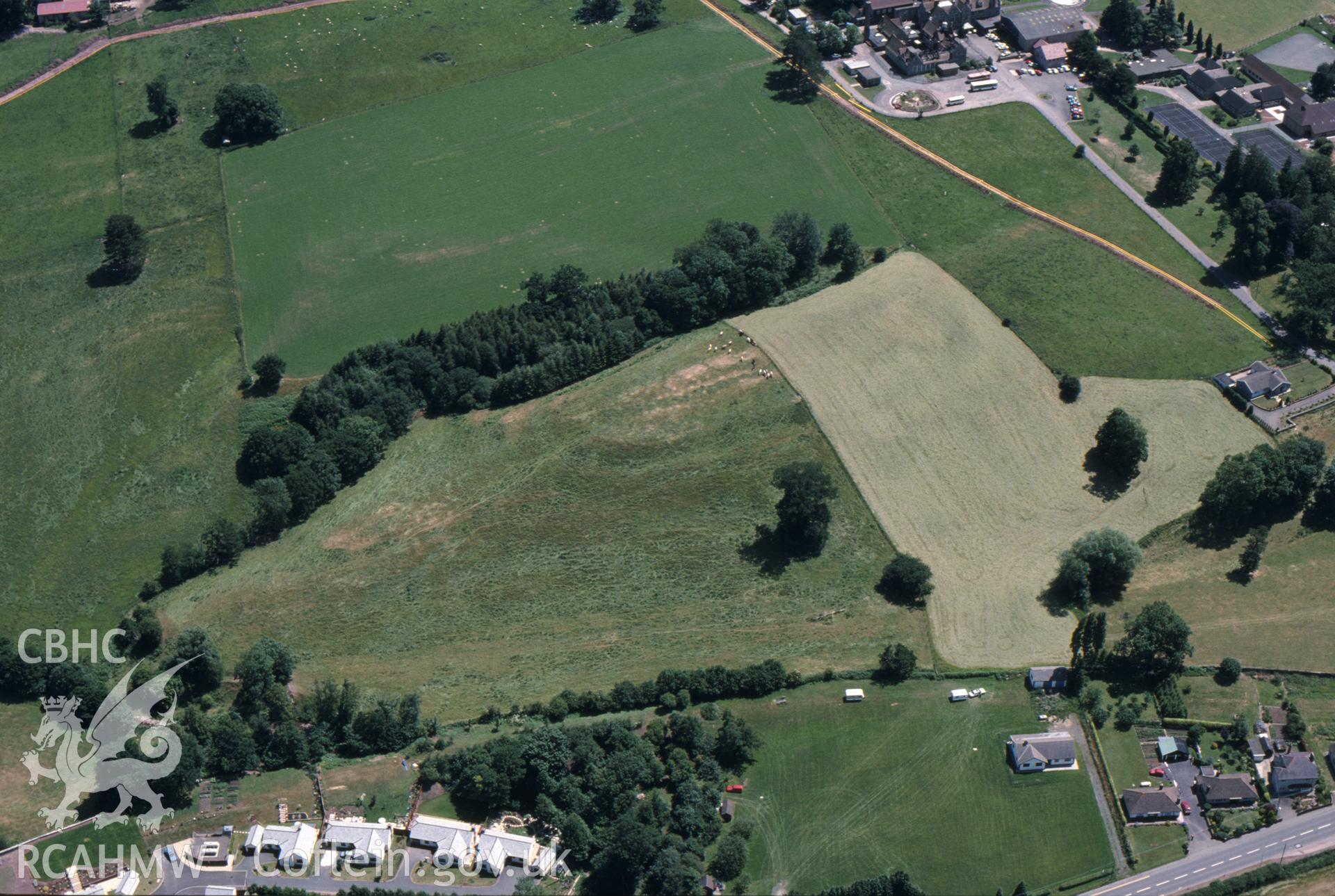 RCAHMW colour slide oblique aerial photograph of Gwernyfed Gaer, Gwernyfed, taken on 06/07/1992 by CR Musson