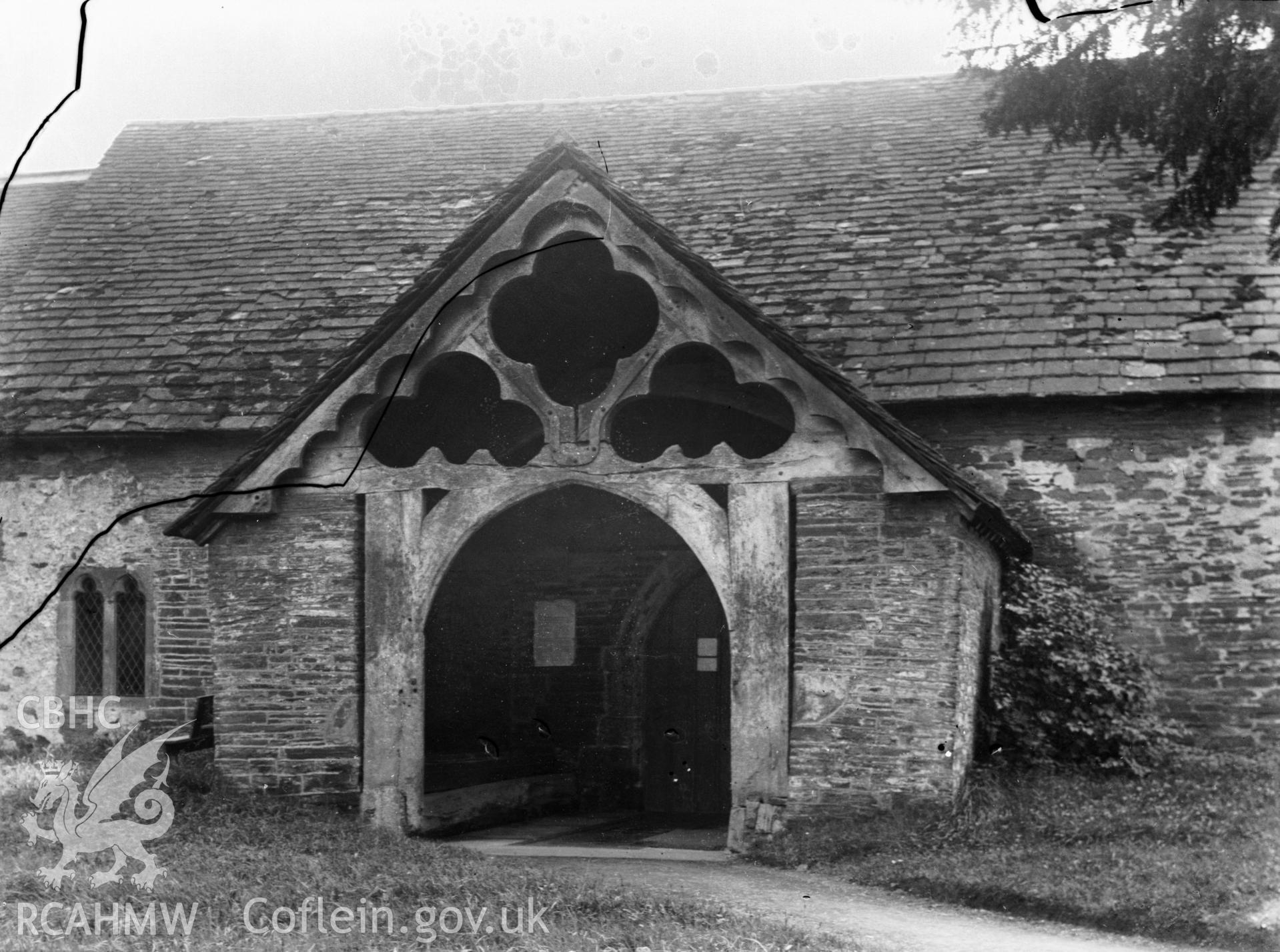 Black and white photo showing the entrance porch at Aberedw Church.