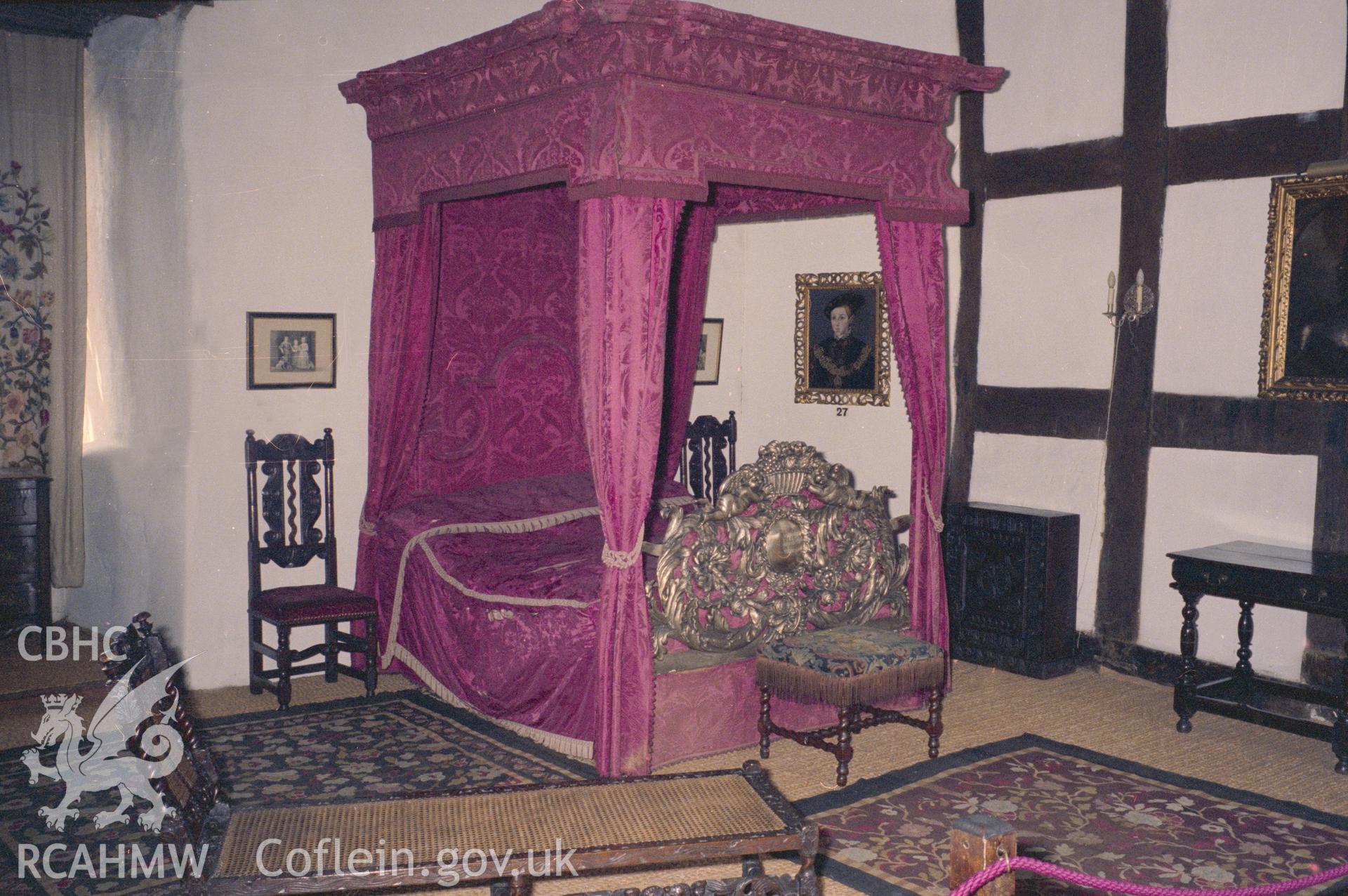 1 colour print showing view of Chirk castle interior (bedroom), collated by the former Central Office of Information.