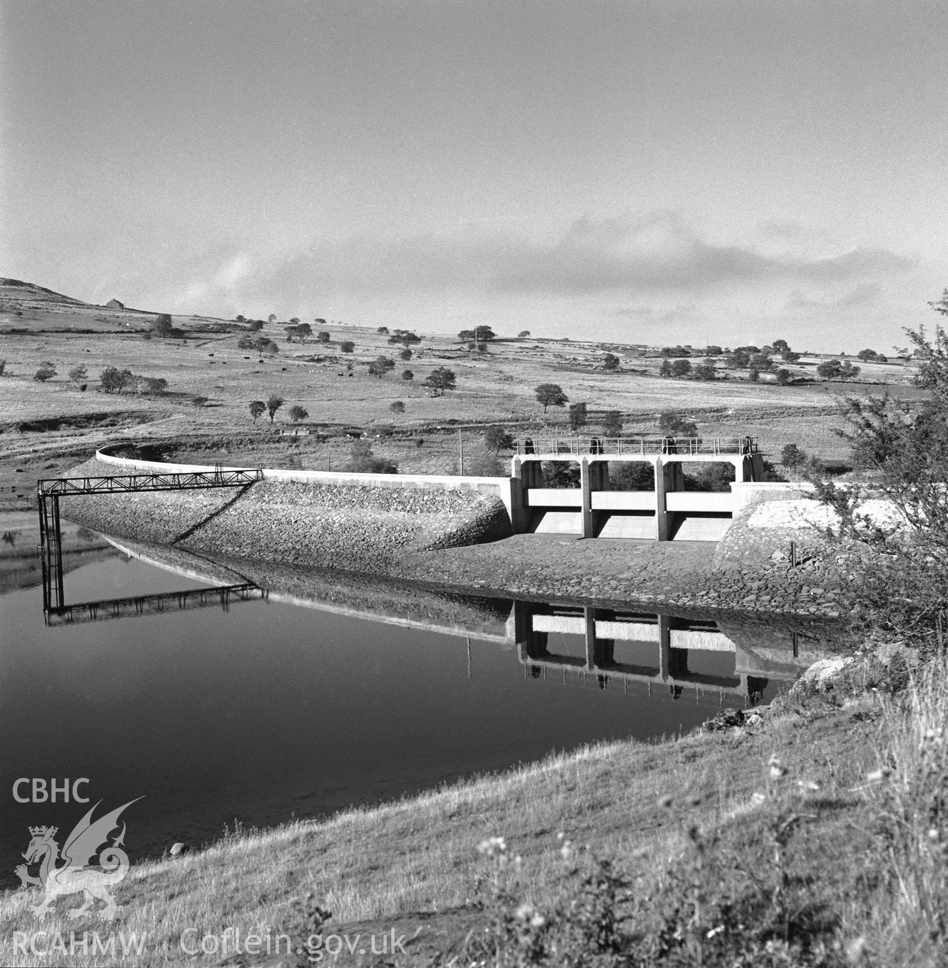 Photographic negative showing view of Dolgarrog holding dam; collated by the former Central Office of Information.