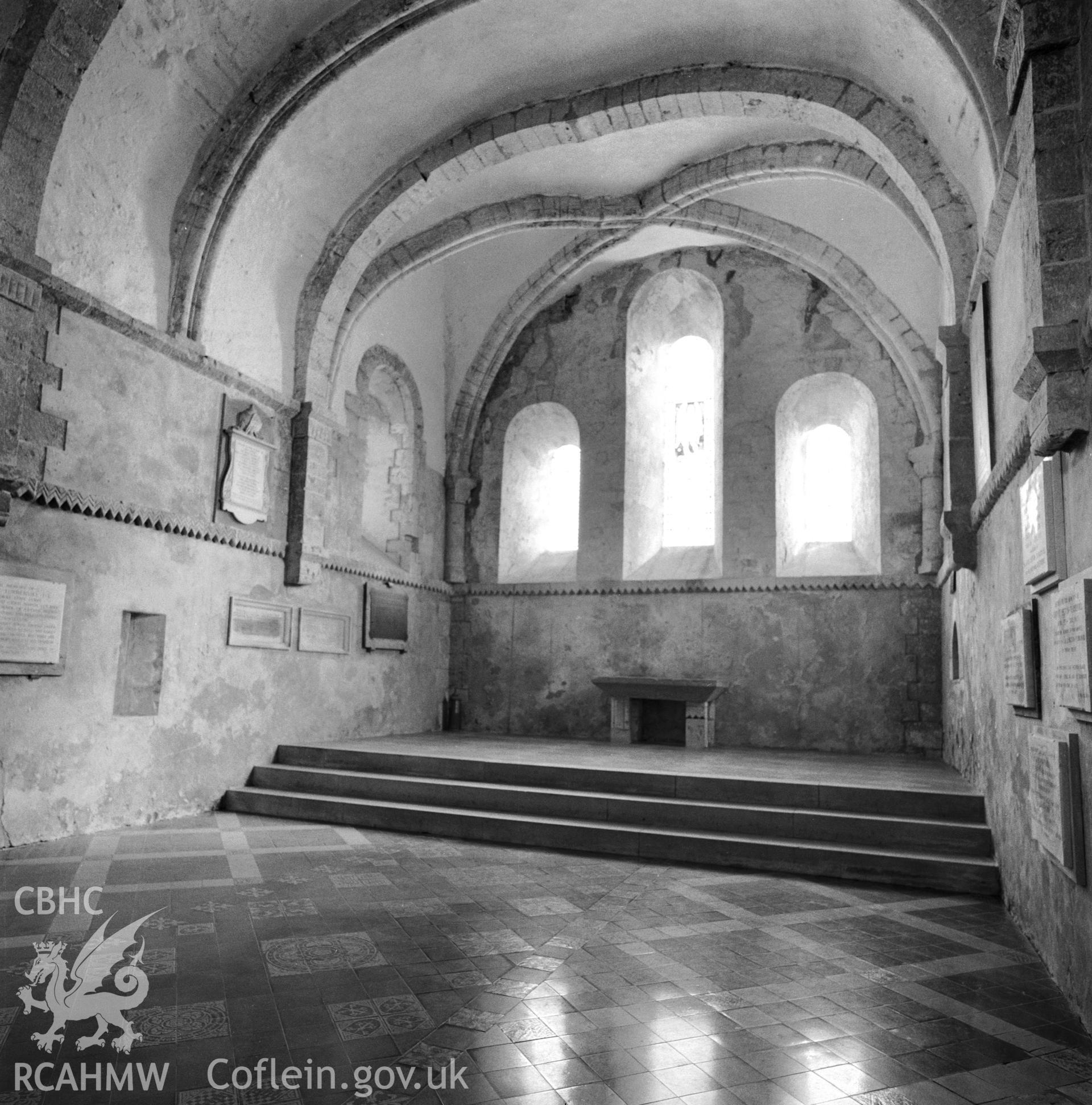 1 b/w print showing interior view of Ewenny Priory with tombstones; collated by the former Central Office of Information.