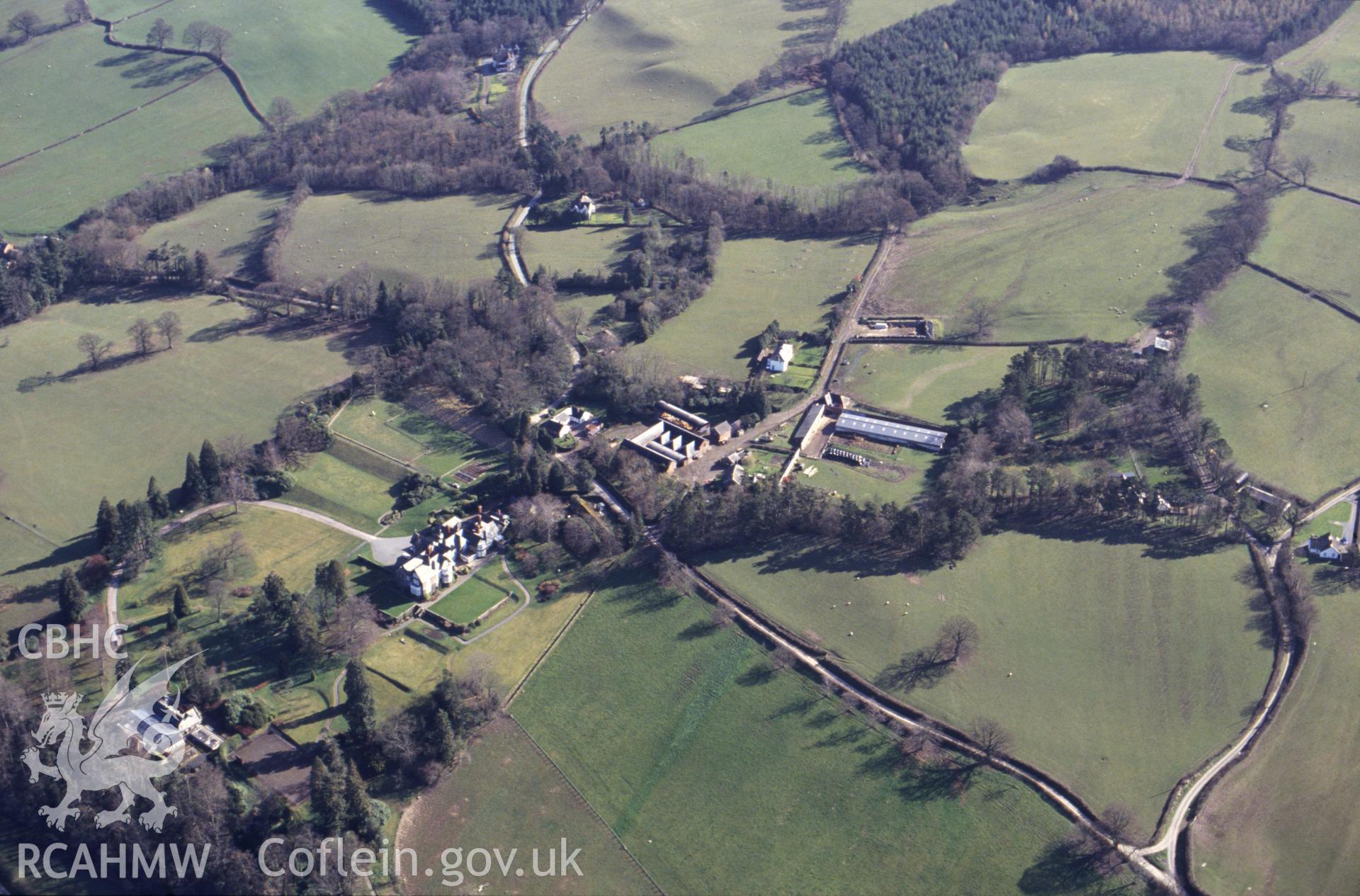 RCAHMW colour slide oblique aerial photograph of Plas Dinam Garden, Llandinam, taken by C.R. Musson, 26/03/94