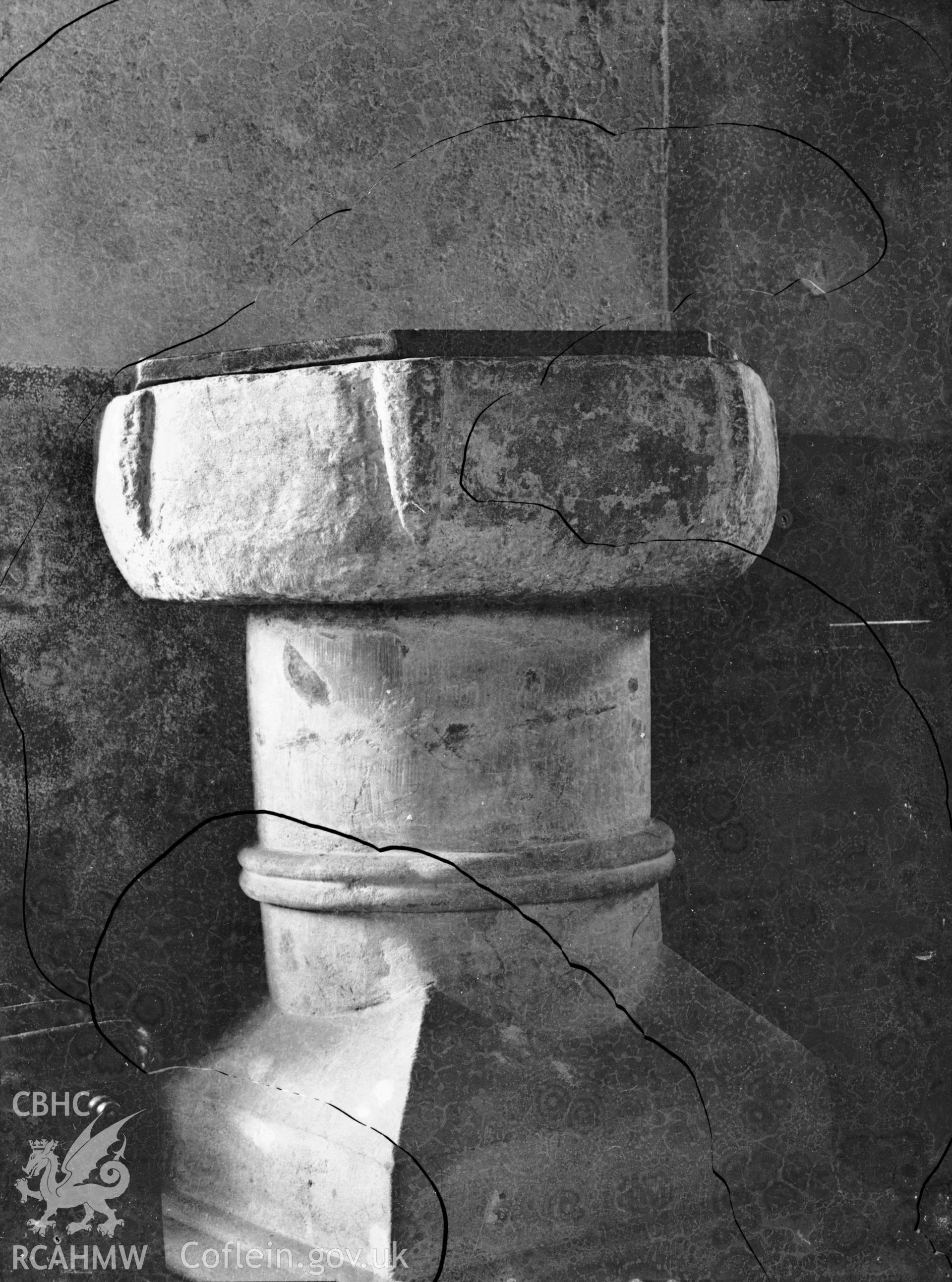 Black and white photo showing the font at Tregaron Church.