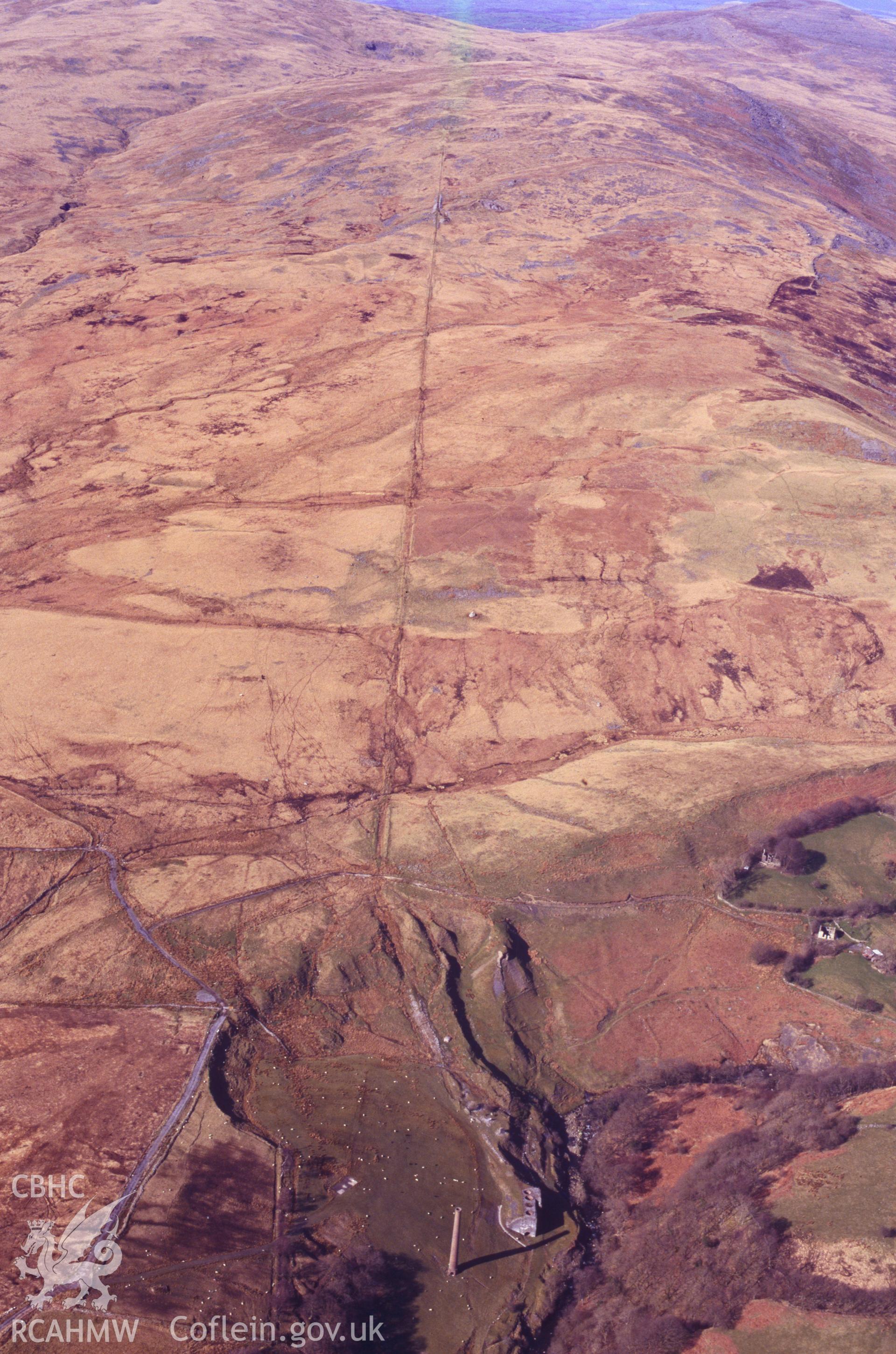 RCAHMW colour oblique aerial photograph of Dismantled Trackway. Taken by C R Musson on 29/03/1995
