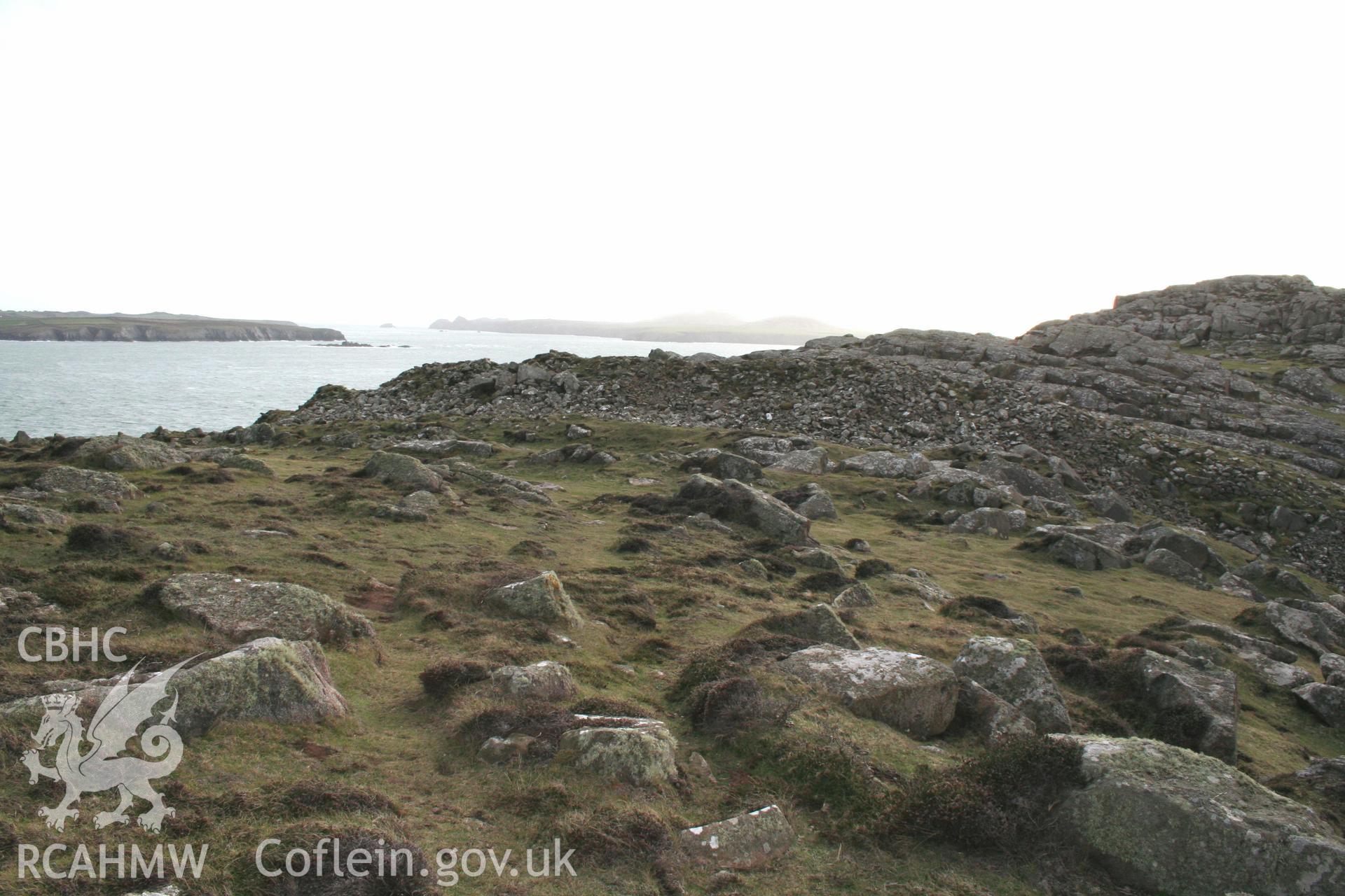 Clawdd y Milwyr promontory fort. General view of main ramparts cutting across promontory from east.